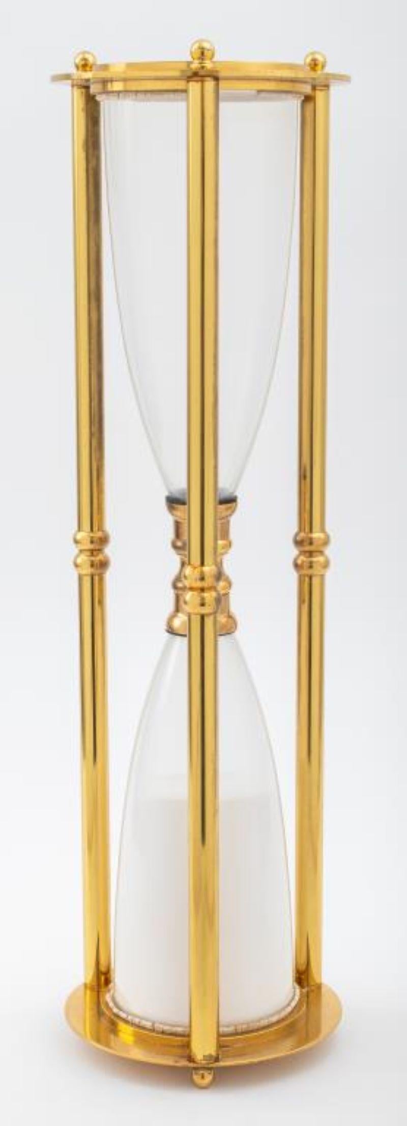 Modern large brass white sand hourglass / timer, unmarked. This item is not functional. 24.25