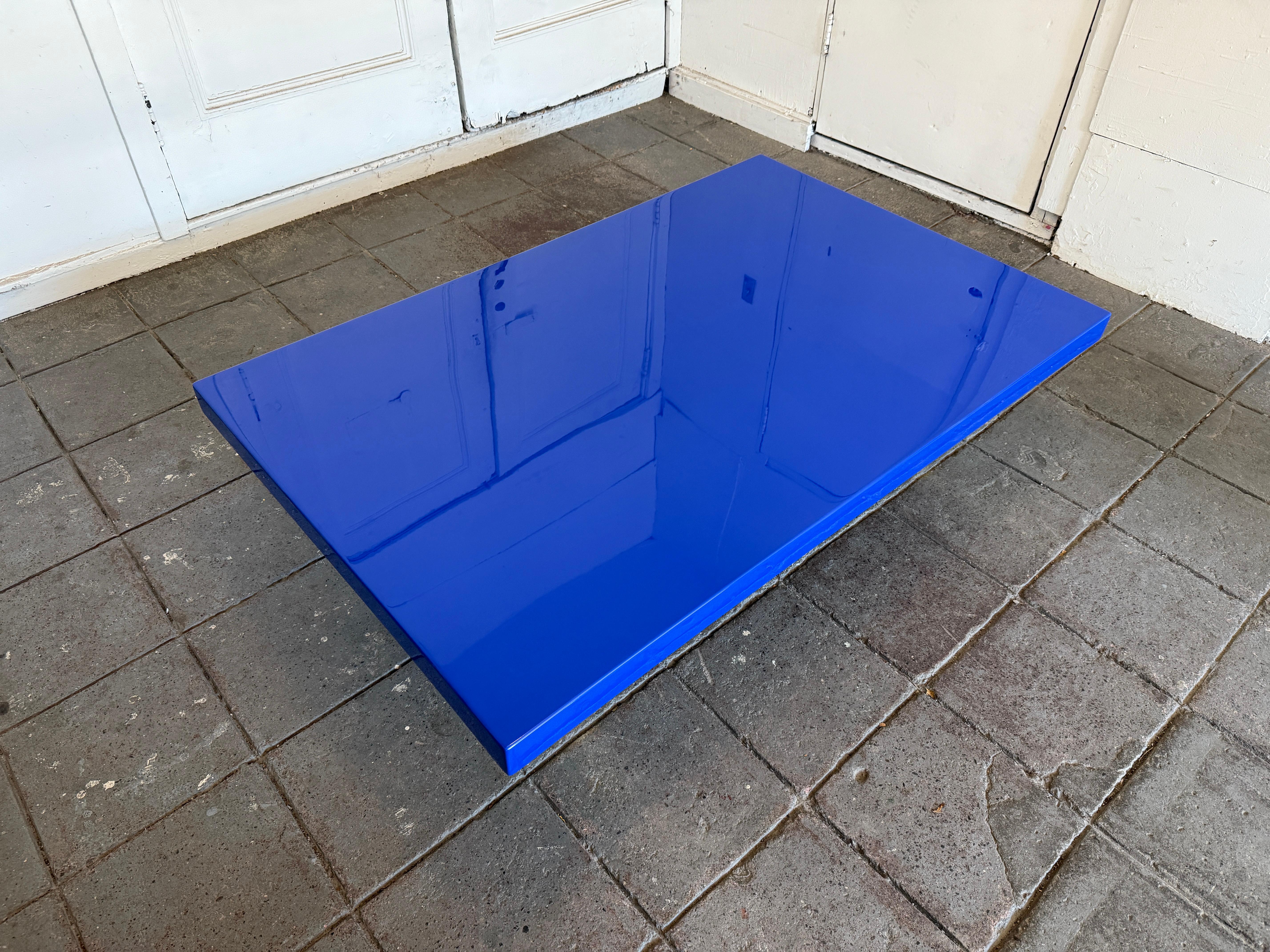 American Modern large low bright blue high gloss lacquer coffee table with brass legs