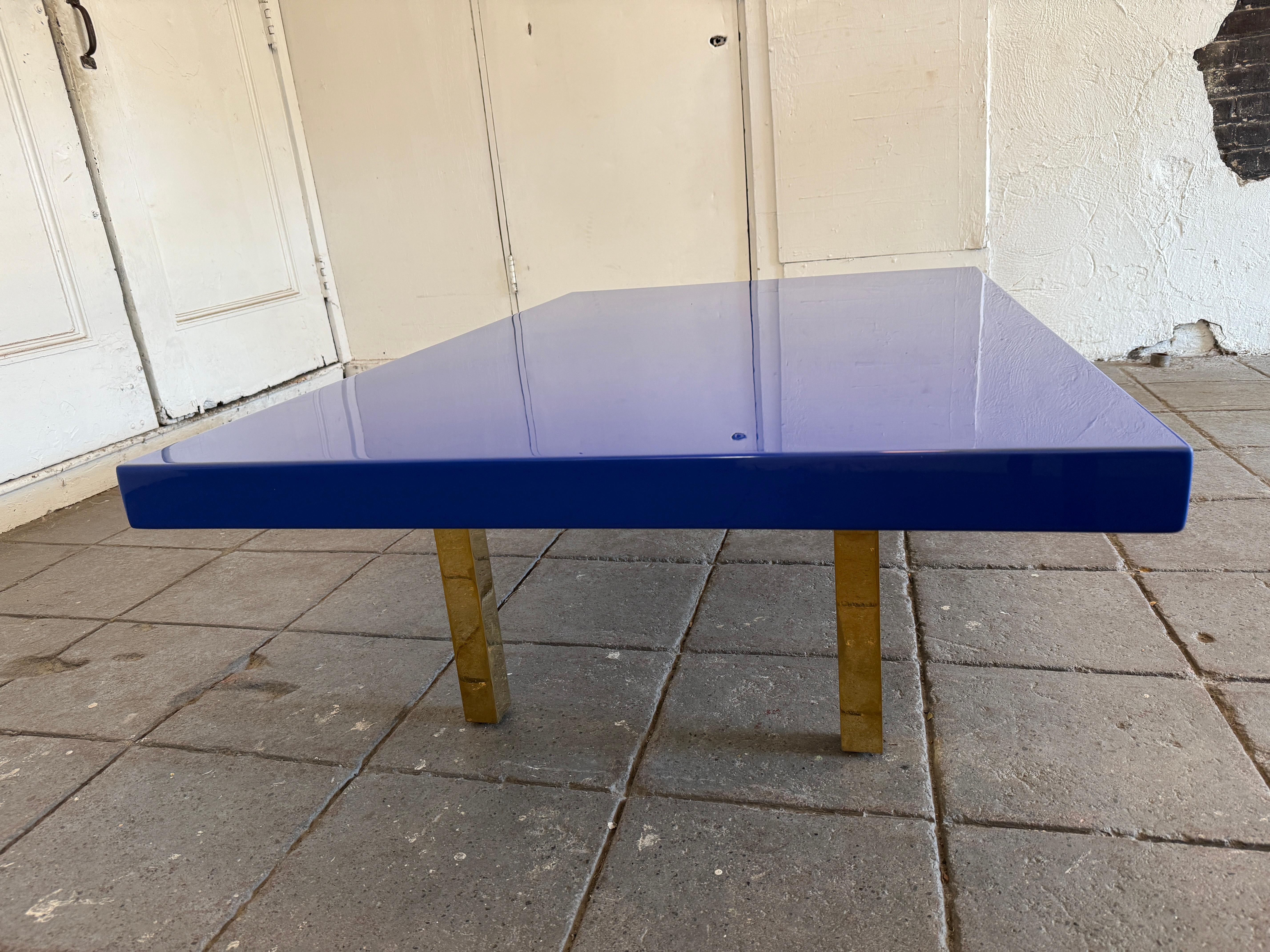 Woodwork Modern large low bright blue high gloss lacquer coffee table with brass legs