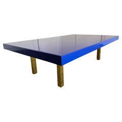 Modern large low bright blue high gloss lacquer coffee table with brass legs