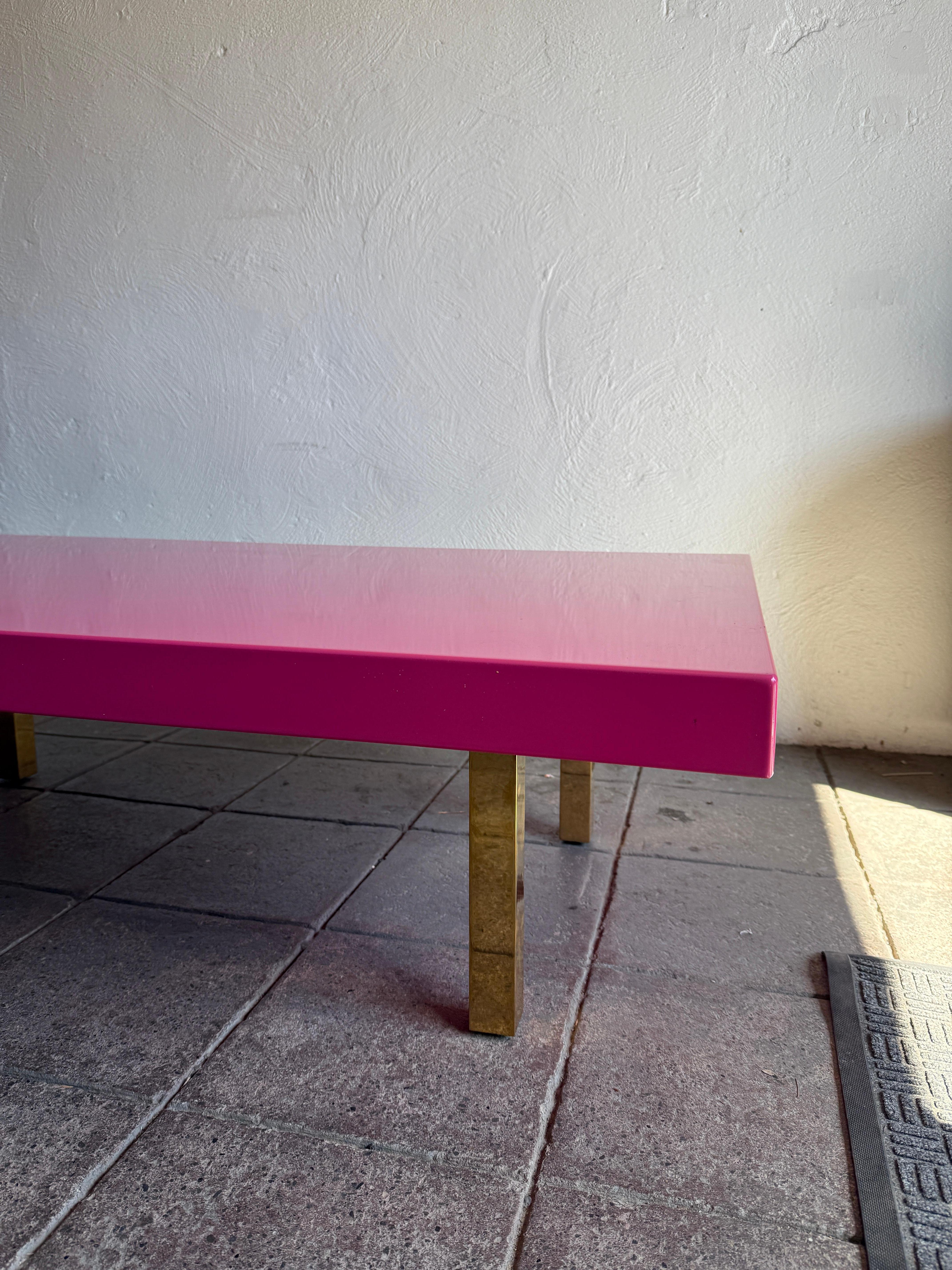 American Modern large low bright pink high gloss lacquer coffee table with brass legs For Sale