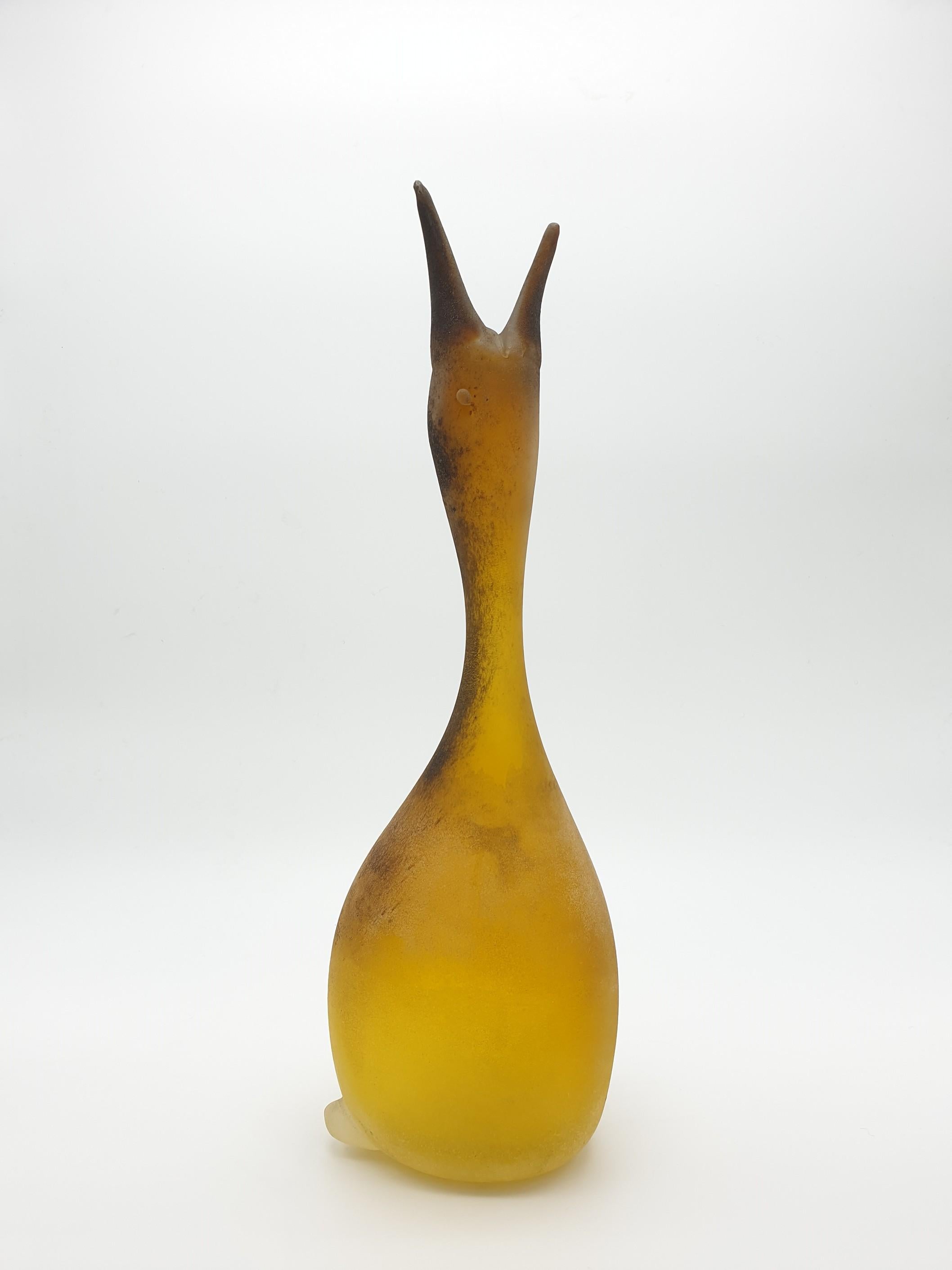This zoomorphic vase, with the neck shaped in the form of a duck head, was designed by Antonio da Ros at the Gino Cenedese e Figlio glass-factory in Murano. This stunning vase in bright yellow color is 45cm tall and has been completely handmade,