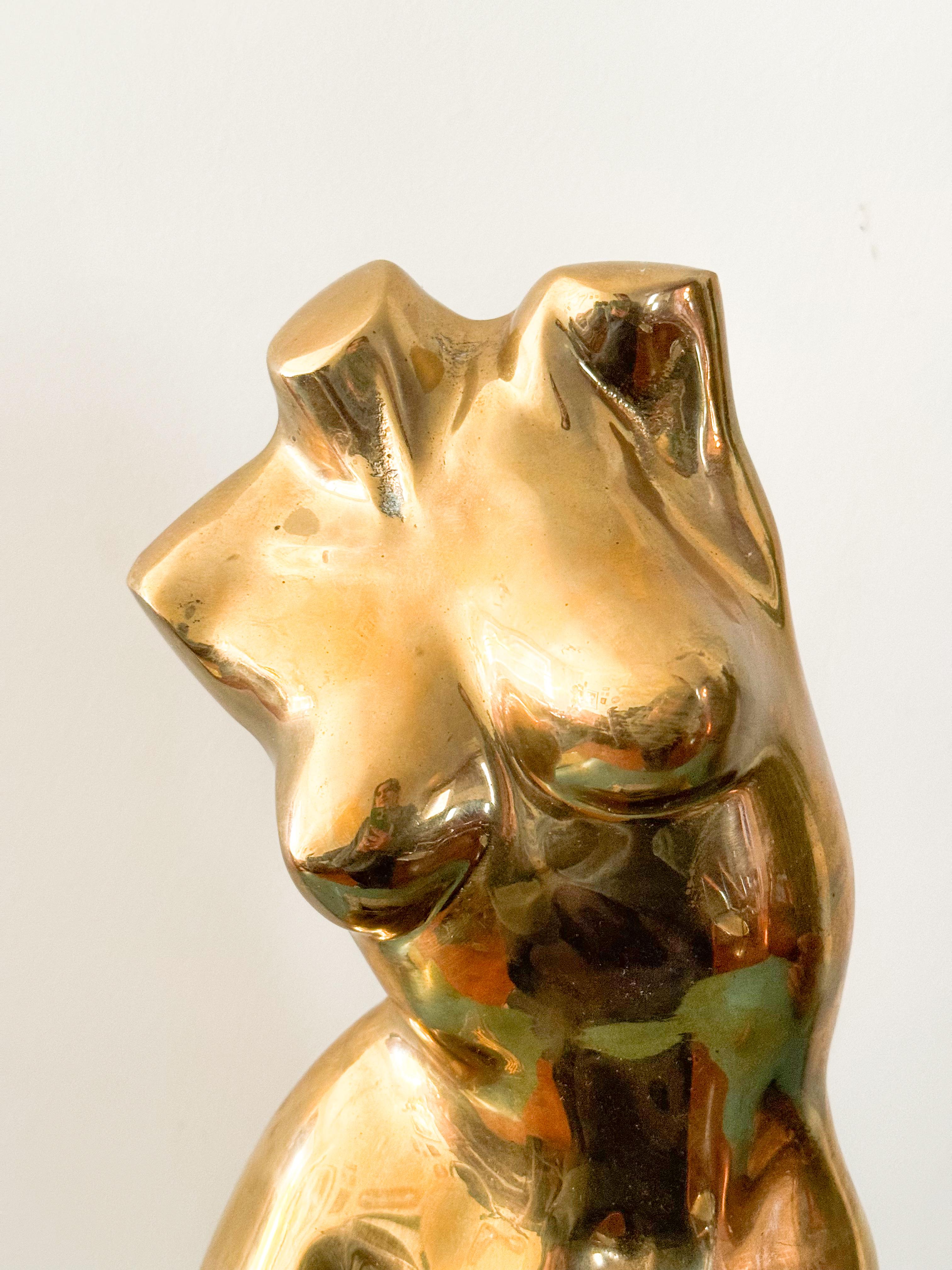 This stunning and unique large nude female torso sculpture is a true statement piece, embodying elegance and modern artistry. In the style of renowned sculptor Diego Ortega, this remarkable mid-century modern sculpture showcases timeless design and