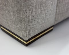 Modern Large Sofa with Large Pull Out Table and Metal Details on Wood Legs