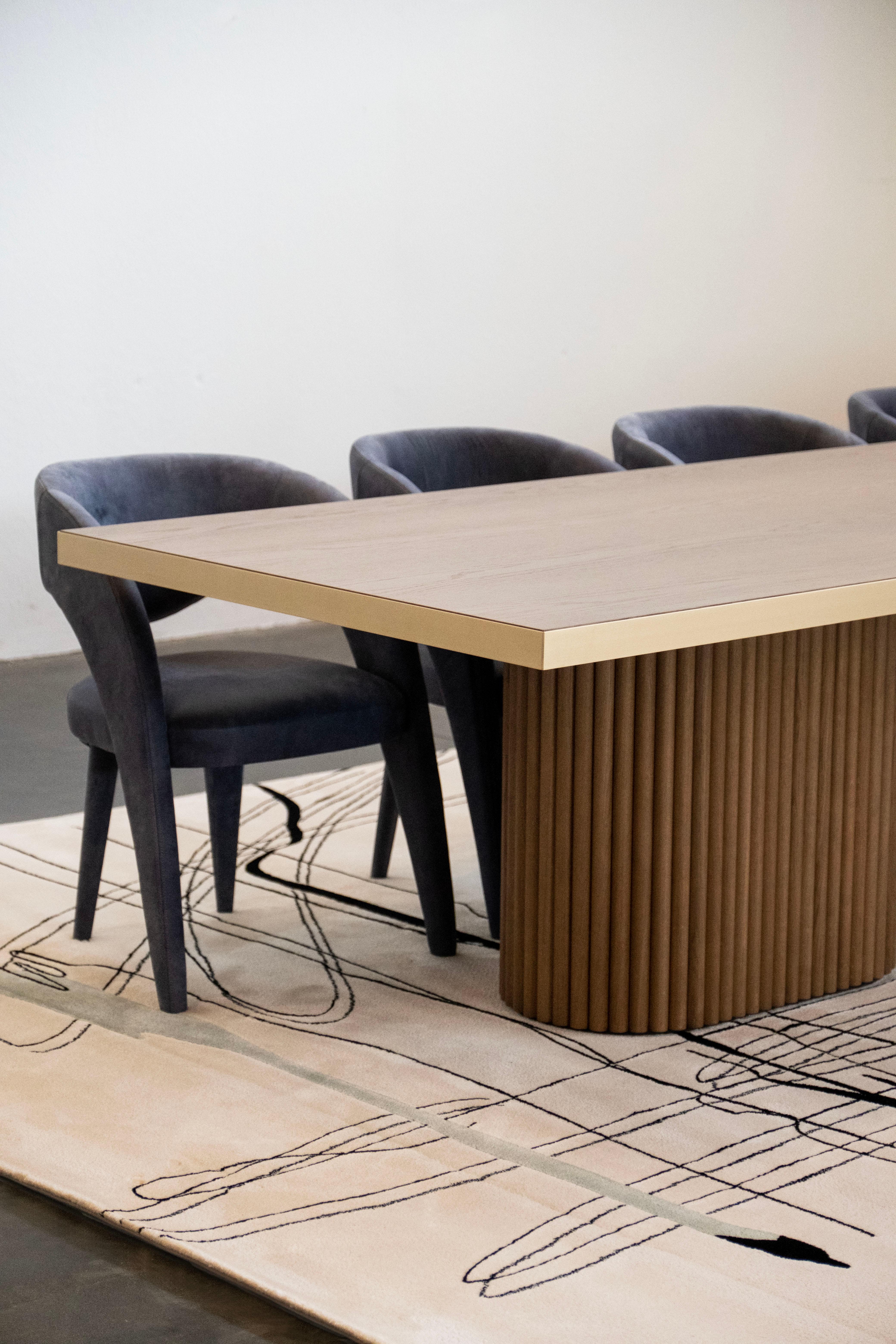 Laurence Chair, Contemporary Collection, Handcrafted in Portugal - Europe by Greenapple.

The Laurence leather dining chair is an artistic tribute to the essence of femininity in contemporary design. With its elegant and daring silhouette, this