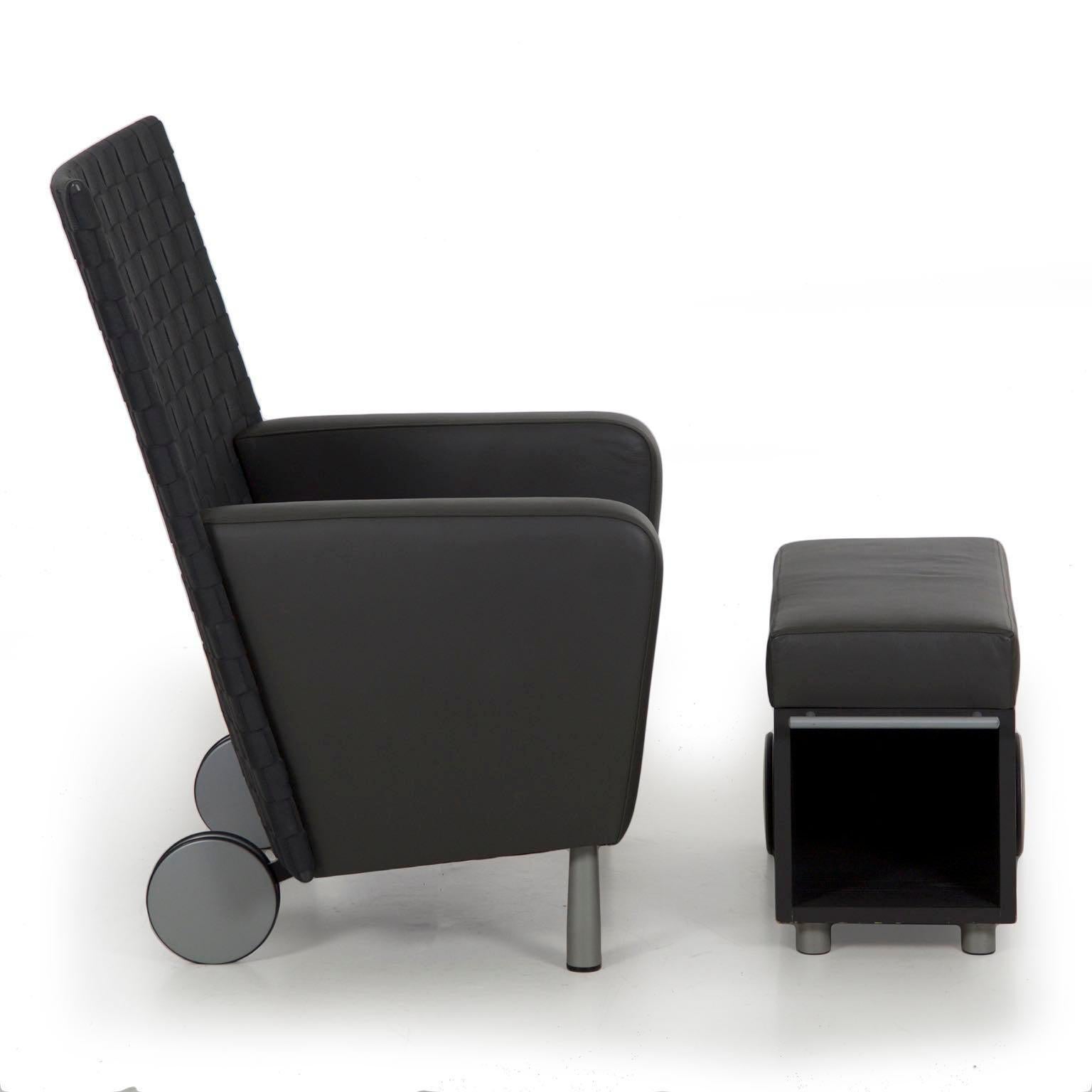 Modern gray leather and woven-back lounge chair with ottoman
Over wheeled back legs, circa 21st century, unmarked 

An interesting and high quality modern lounge chair with matching ottoman, this matched set is a vivid strike point that is robust