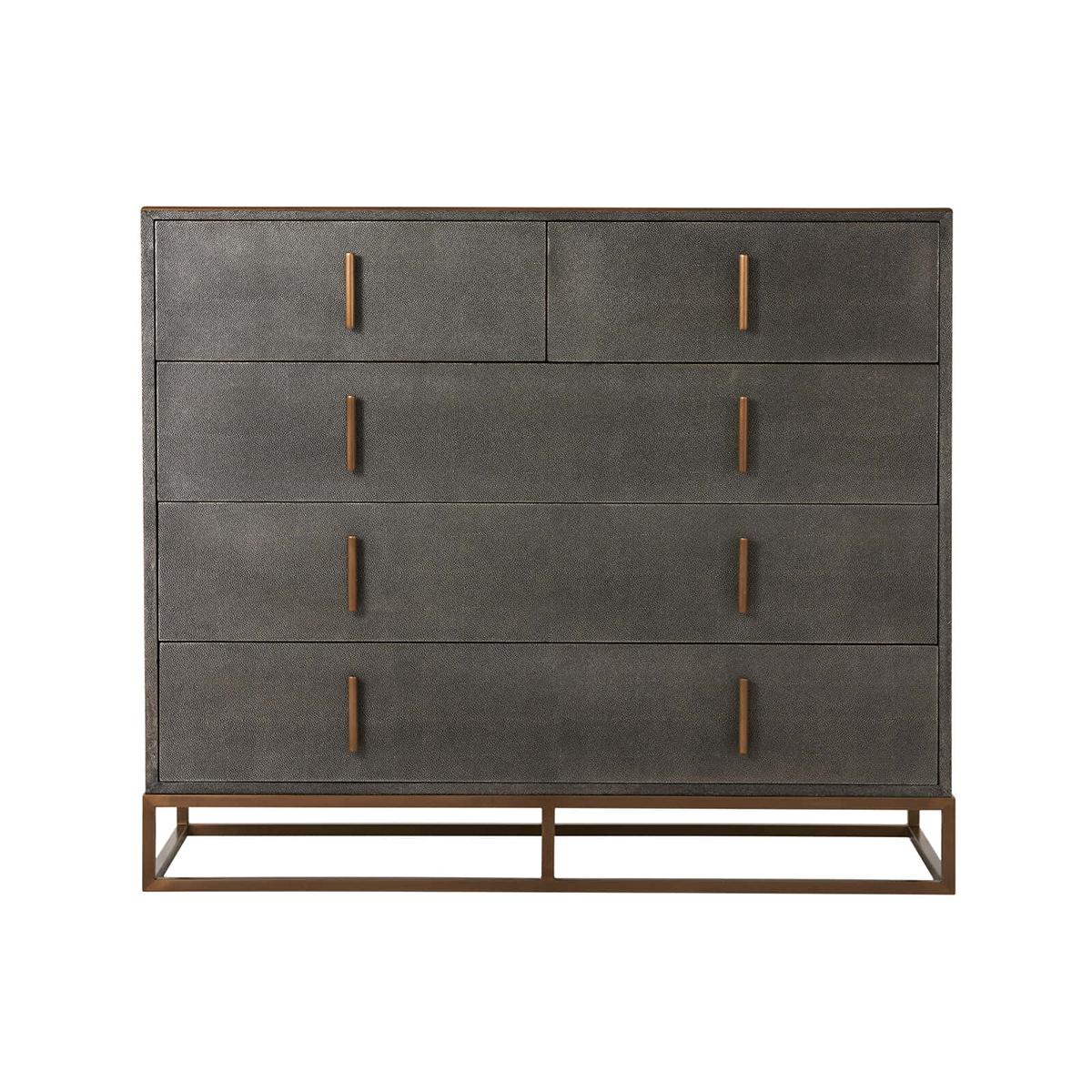 Modern Leather Chest of drawers with a shagreen embossed leather wrapped case in our dark tempest finish with two short above three long drawers, brass finish hardware and cube base.

Dimensions: 50