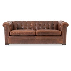 Sofa Chesterfield moderne en cuir