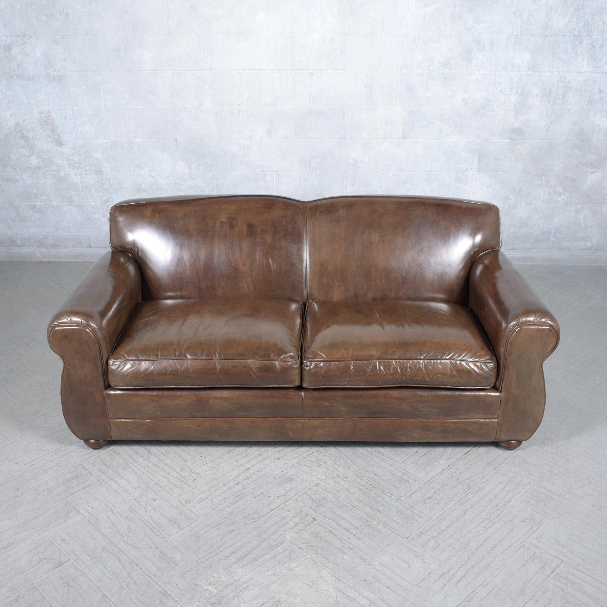Transform your living or office area with the timeless elegance and luxurious comfort of our Modern Leather Club Sofa. Expertly revitalized by our skilled craftsmen, this sofa showcases a rich chocolate brown hue, enriched with a unique patina