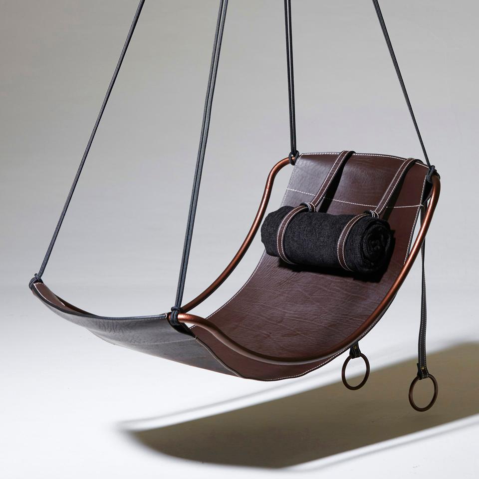 The Slim Sling is  a refined evolution of our beloved and best-selling SLING swing seat. This rendition places the spotlight on the leather seat, suspended gracefully within the frame, delivering a sleek, sexy, and extremely comfortable experience.