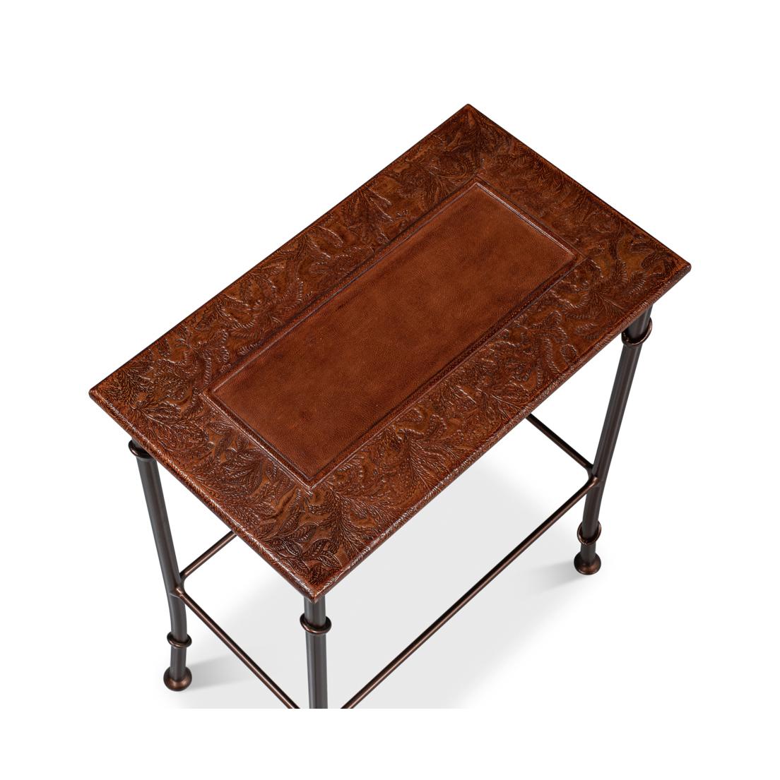 The top of these tables features a hand-embossed design. Each table sits on hand-wrought metal legs with a faux bamboo style design. The tables have a graduated size for storage and use. 

Dimensions:
Large: 23