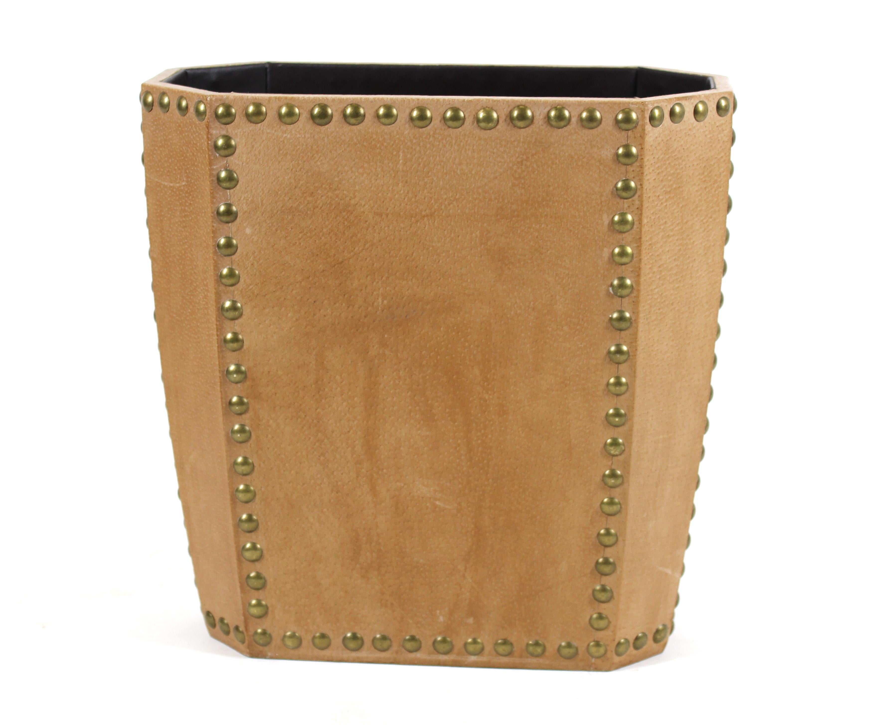 Modern leather and studded waste paper basket. In great vintage condition with age-appropriate wear.