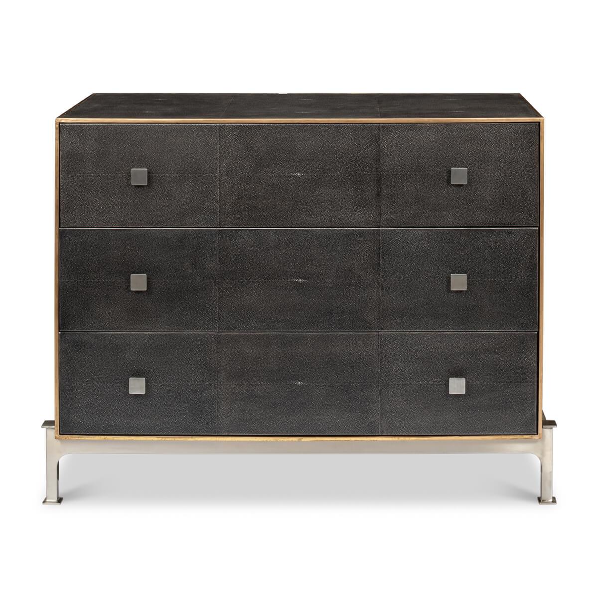 Modern leather wrapped dresser a modern grey shagreen leather and metal three-drawer chest. This piece has a look of luxury and sophistication with mixed colors, metals, and textures. This chest is covered in a grey textured leather modeled after