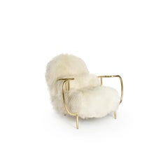 Modern Liberty Armchair Low Back in Polished Brass and White Sheep Fur Cushions