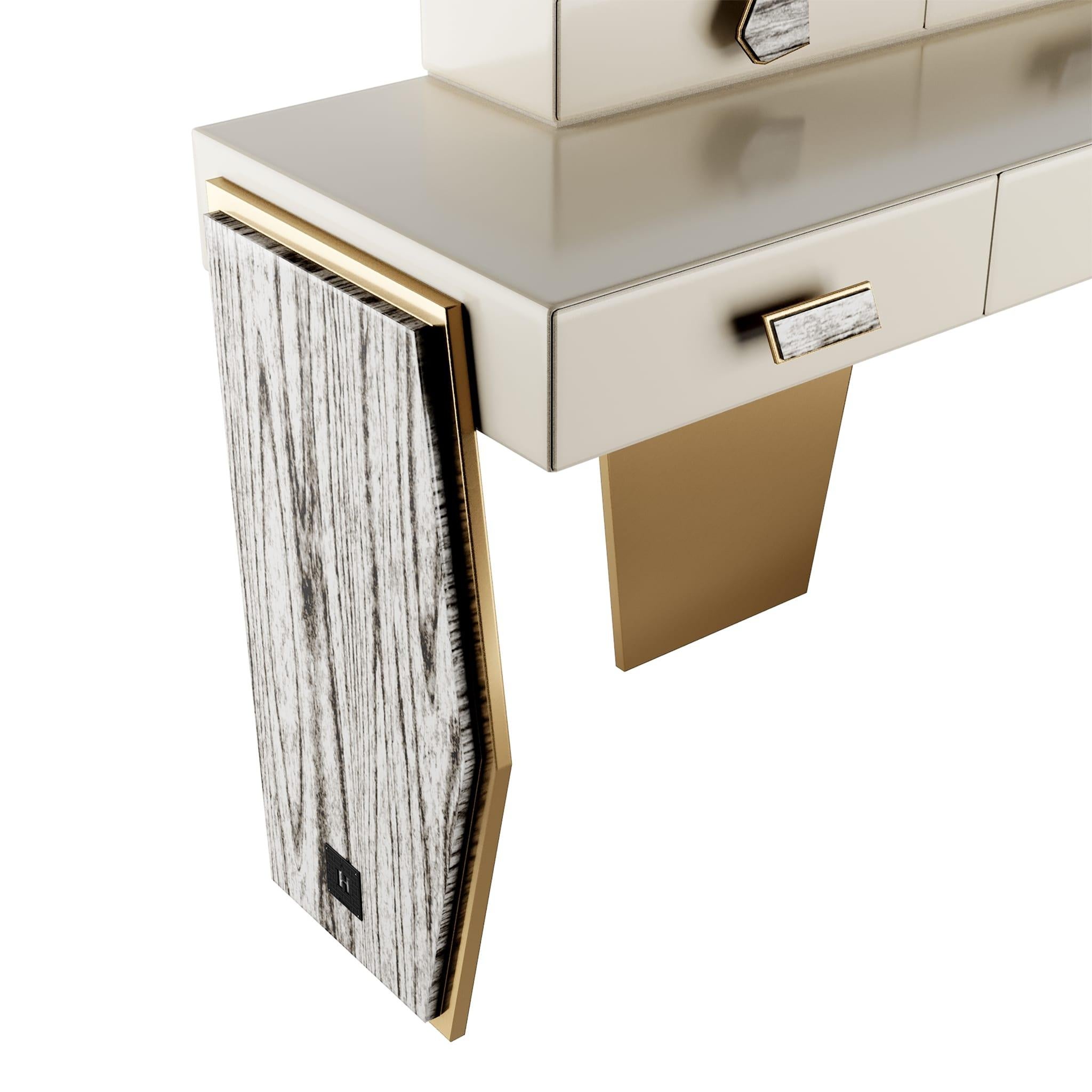 Modern light cream console or dressing table in lacquered wood & polished brass Malala console table

The beautiful Malala console table chooses to be different – it’s a modern piece for contemporary design Let this luxury console table transform
