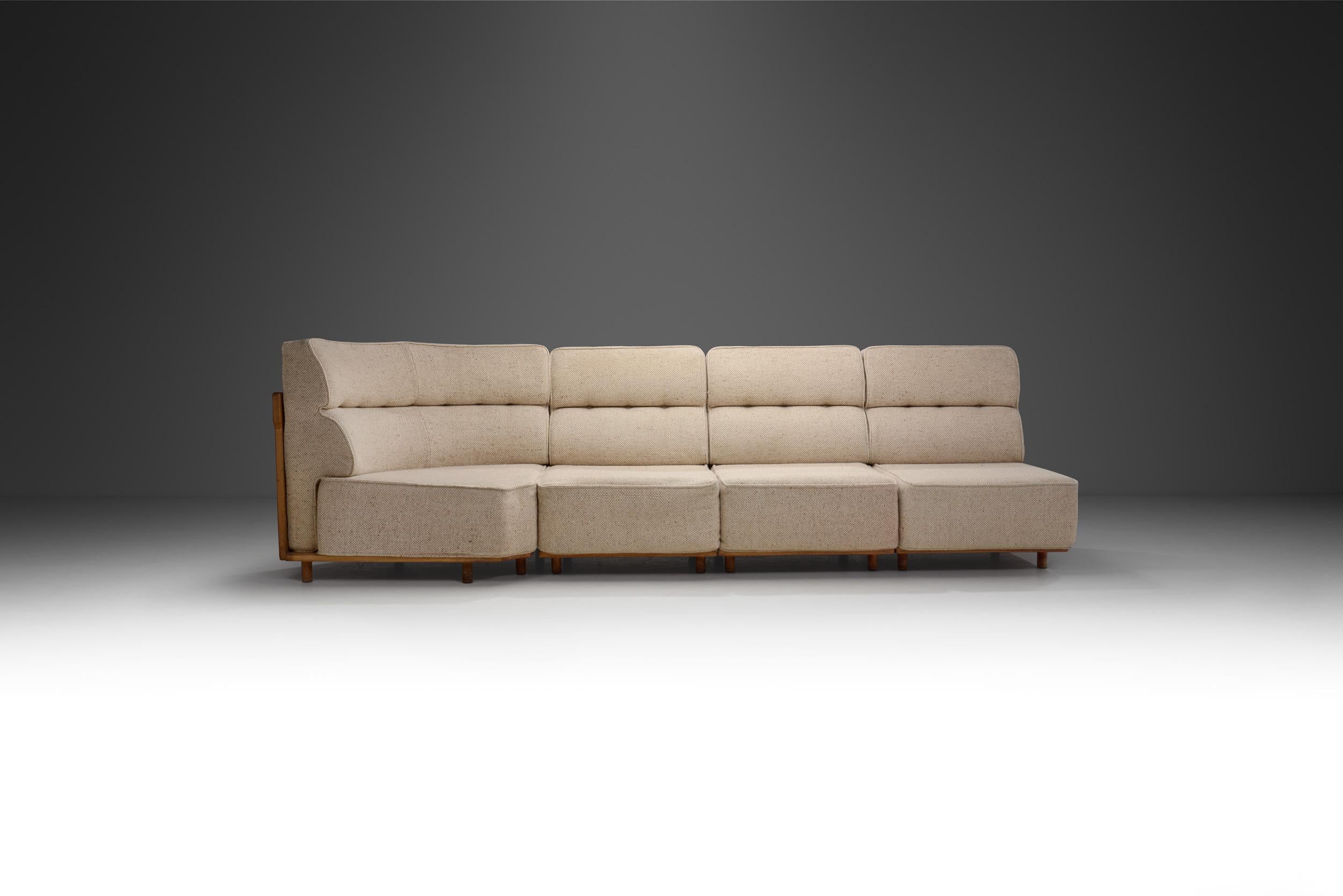 French design duo, Robert Guillerme and Jacques Chambron, are known for their high-quality, solid oak furniture created for their own company, Votre Maison. Like most of their designs, this sofa model displays a beautiful contrast between the oak