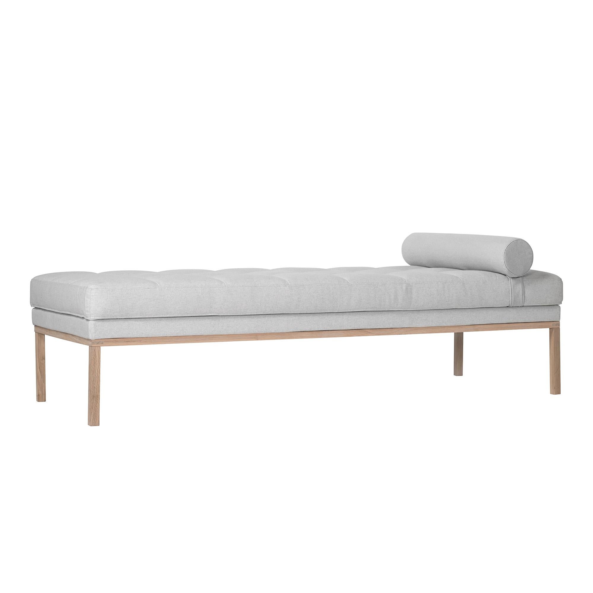 Clean and modern line design daybed with white oiled oak frame and bolster pillow. Also available in mustard yellow upholstery with smoked oak frame.