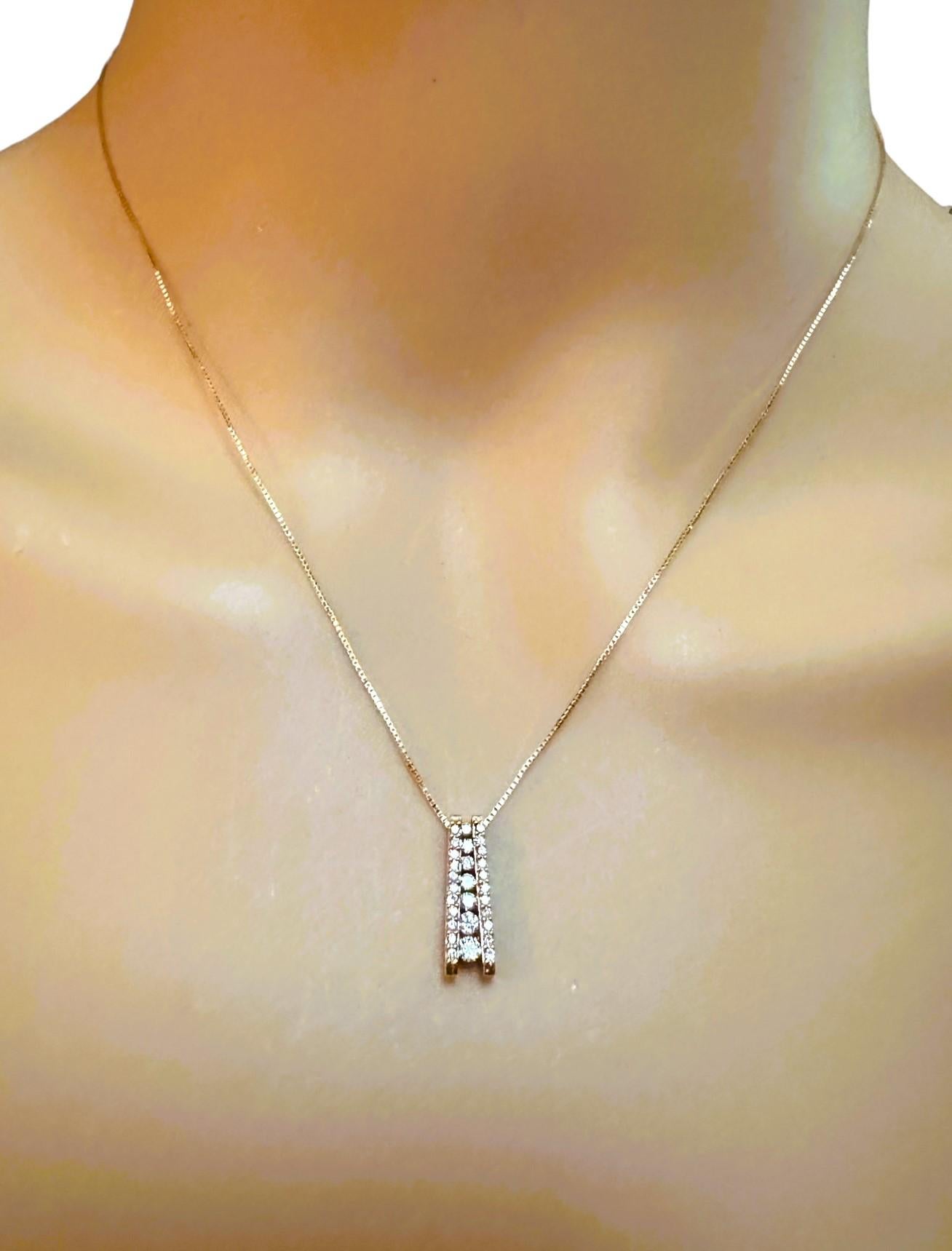 I just love this necklace!  The design is just so cool.  It has 28 brilliant cut diamonds measuring from 3.00 x 3.00 x 2.50 mm to 1.5 x 1.5 x 1.2 mm.  The Clarity is SI1 and the Color is H-I.  They total .75 cts.  The pendant is stamped 