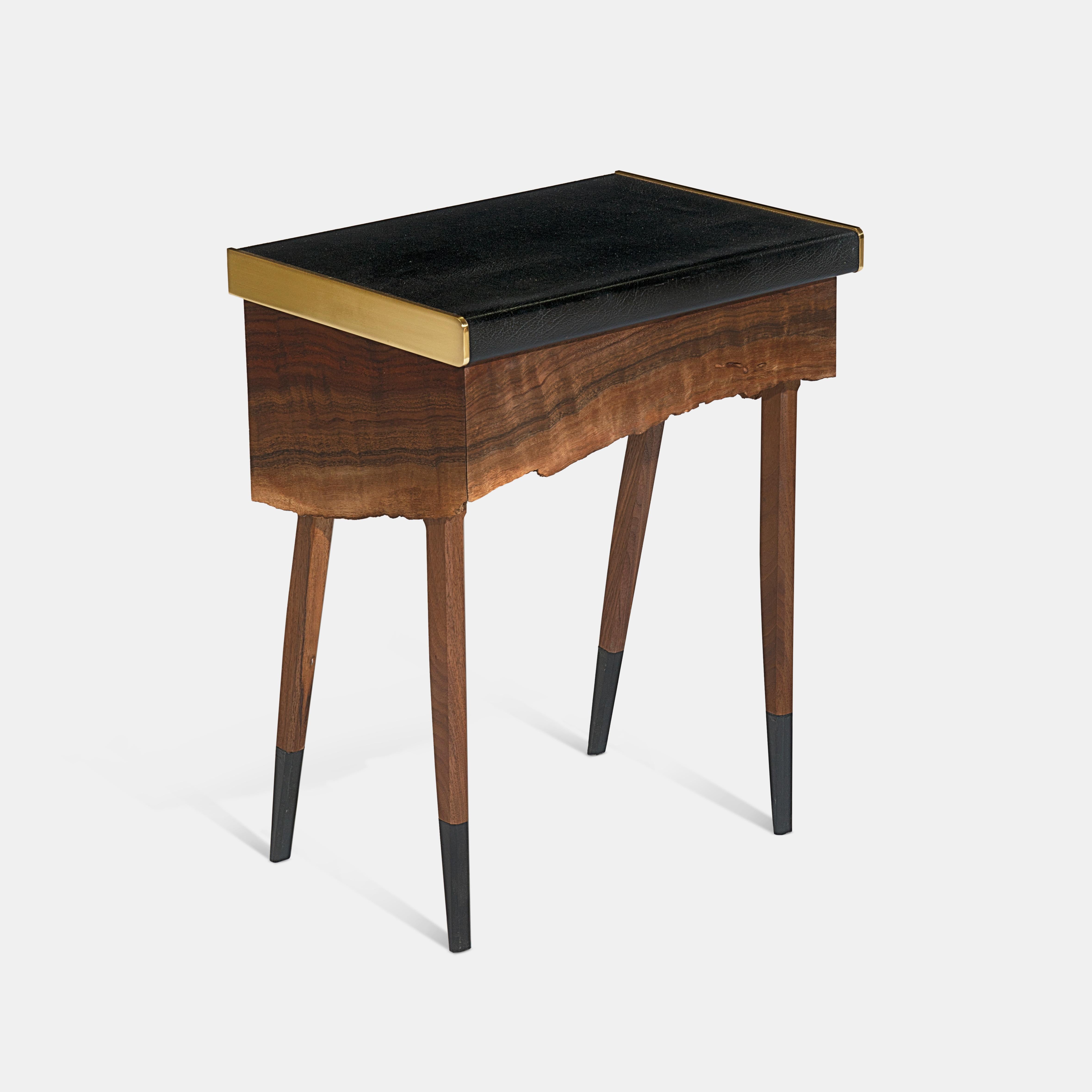 One of a kind, customizable side table from Jessie Nelson Studio. Each table is unique to the live edge sourced. Table is made of a single piece of live edge claro walnut, crafted to make the sides and face of the drawer. The wood grain wraps
