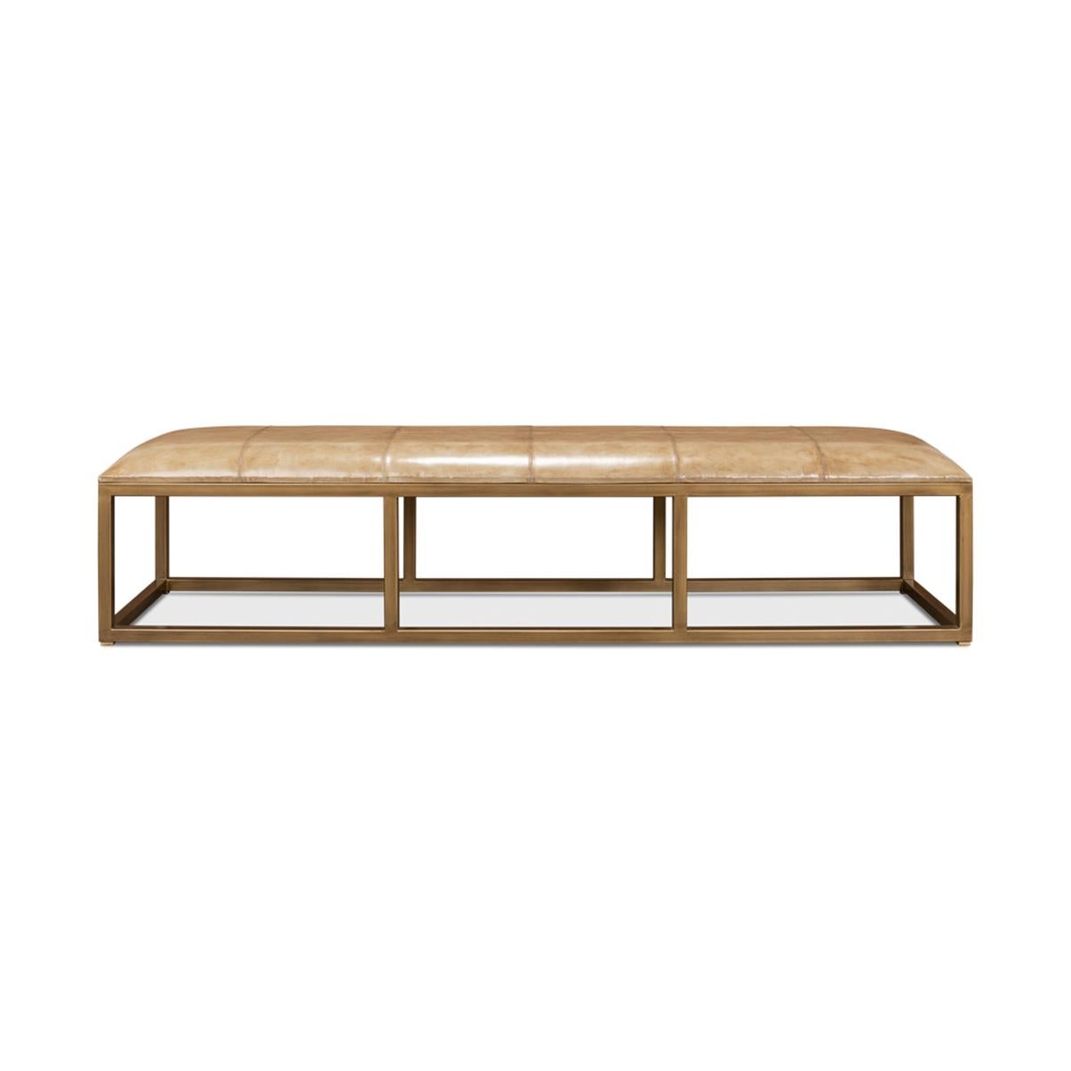 Modern long hall bench with a beige antiqued leather stitched cushion on an antiqued brass-finished iron cube form base.

Dimensions: 75