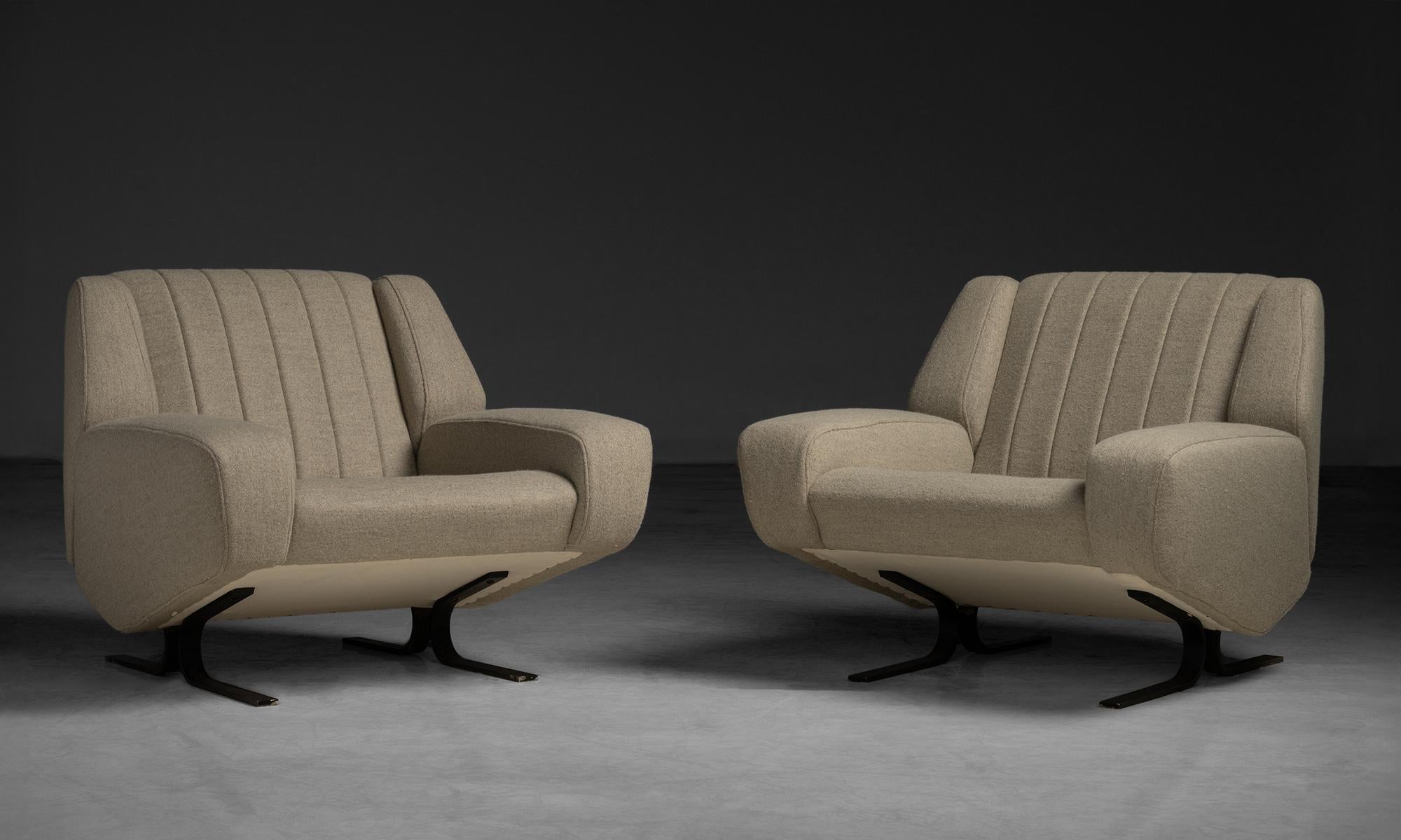 Modern Lounge Chairs in Pierre Frey Wool
Italy, 1970
Symmetric lounge chairs with black metal curved legs, newly upholstered in wool blend by Pierre Frey.
35”w x 34”d x 29”h x 16.5” seat