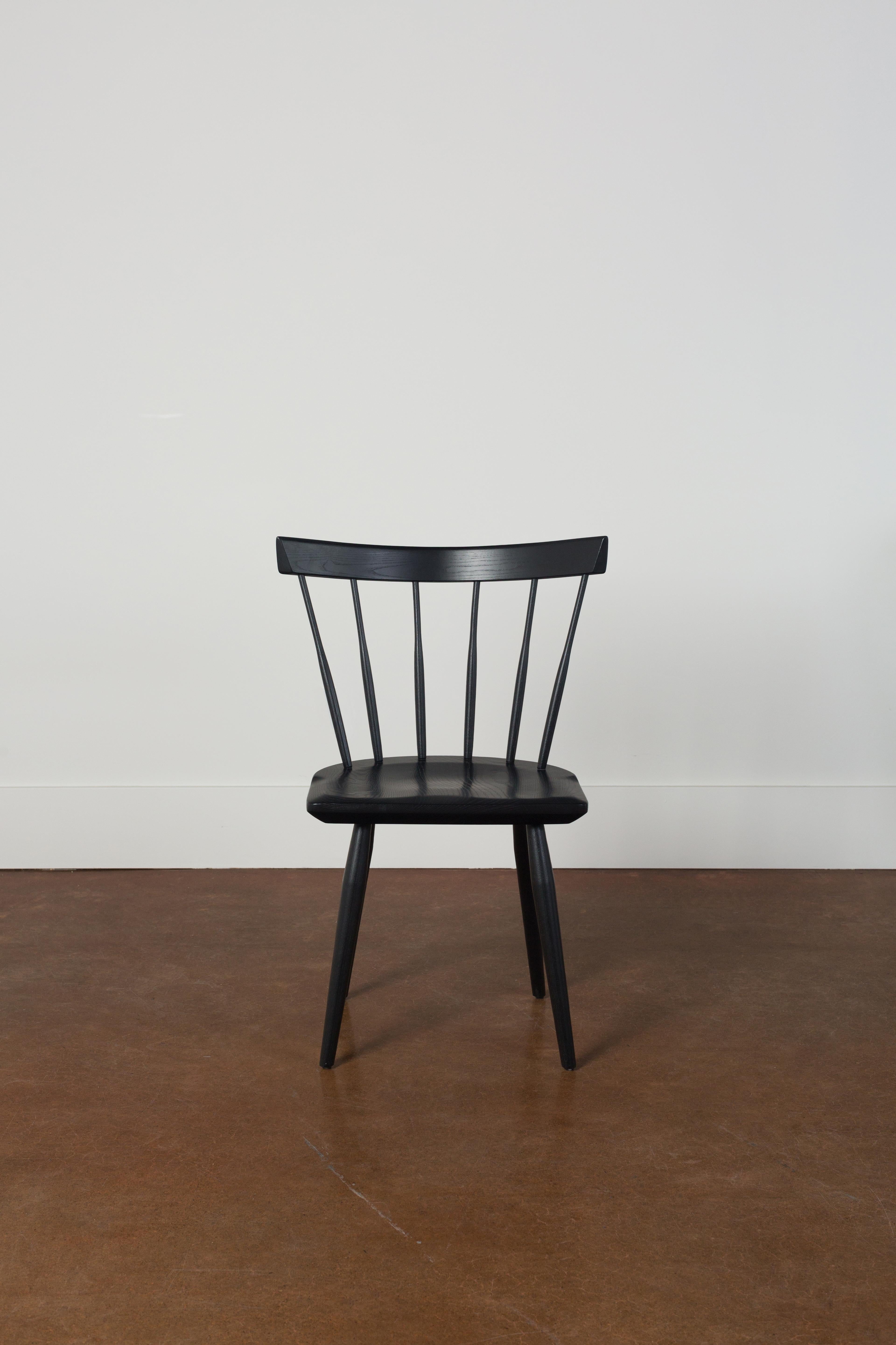 A Windsor chair that’s more city than country.

If you’ve ever visited an Indigo bookstore, you may have already enjoyed the comfort of our iconic modern low-back Windsor chairs. Now, you can take that comfort and craftsmanship home.

This side