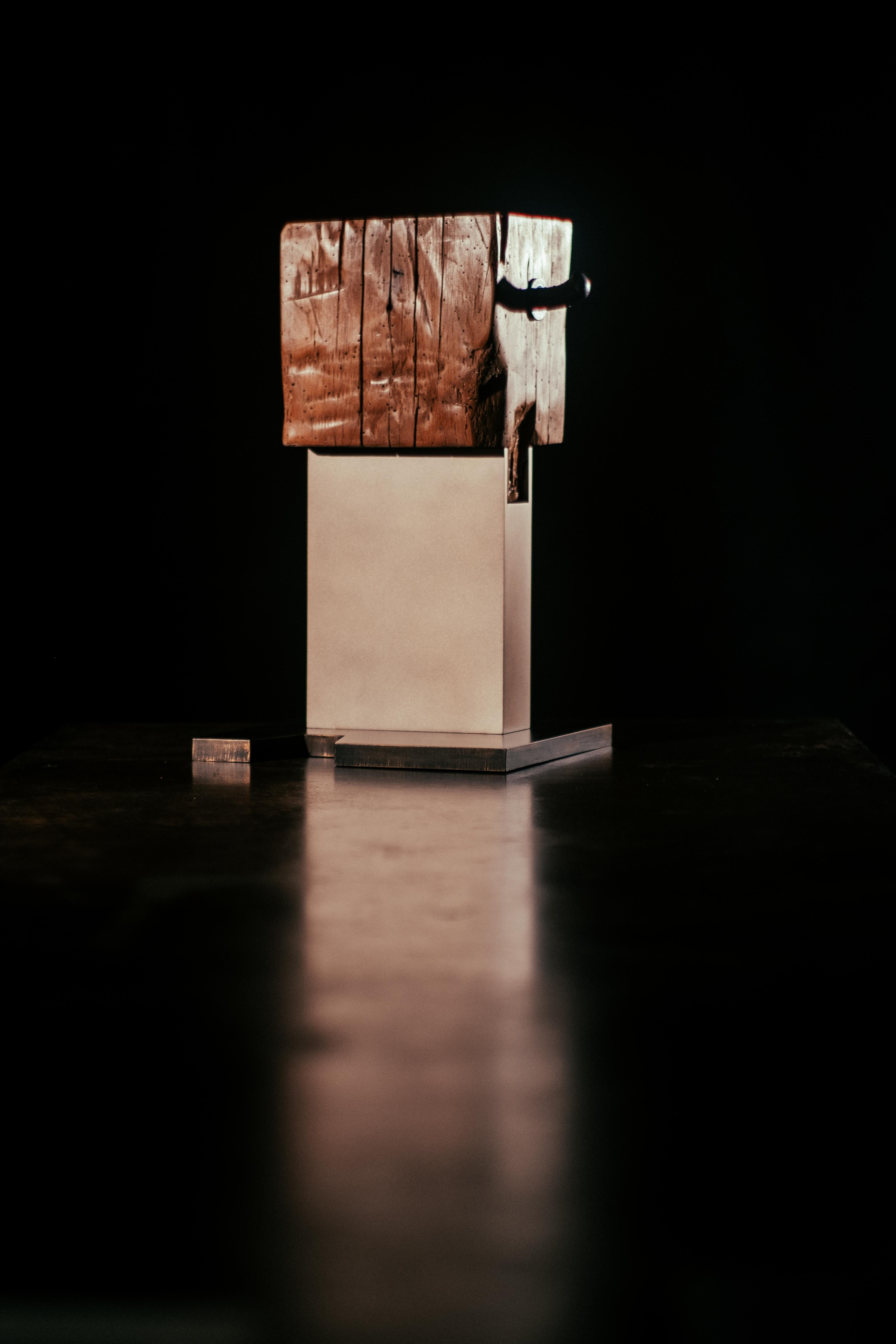 Modern Low Column Stool/Side Table 

Patinated architectural bronze plate, lacquered aluminum, oiled wood, forged hot rolled steel

Dimensions: 11.5” L x 10.5” W x 18.5” H 
Weight: 40lbs 

1 of 1
 