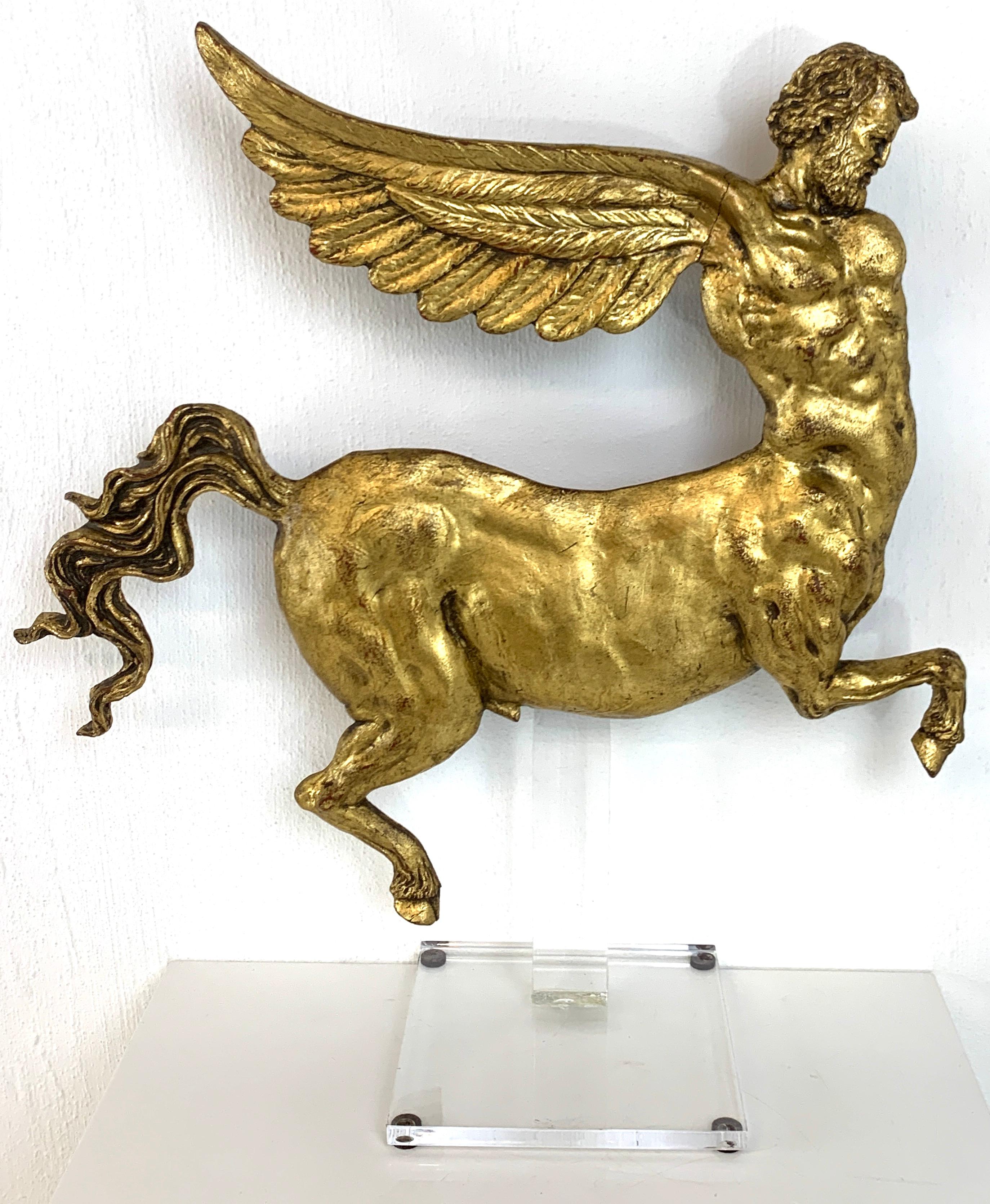 Modern Lucite and gilt lacquer figure of a Centaur, of large size, 19-inches high x 17 inches wide, raised on a 6