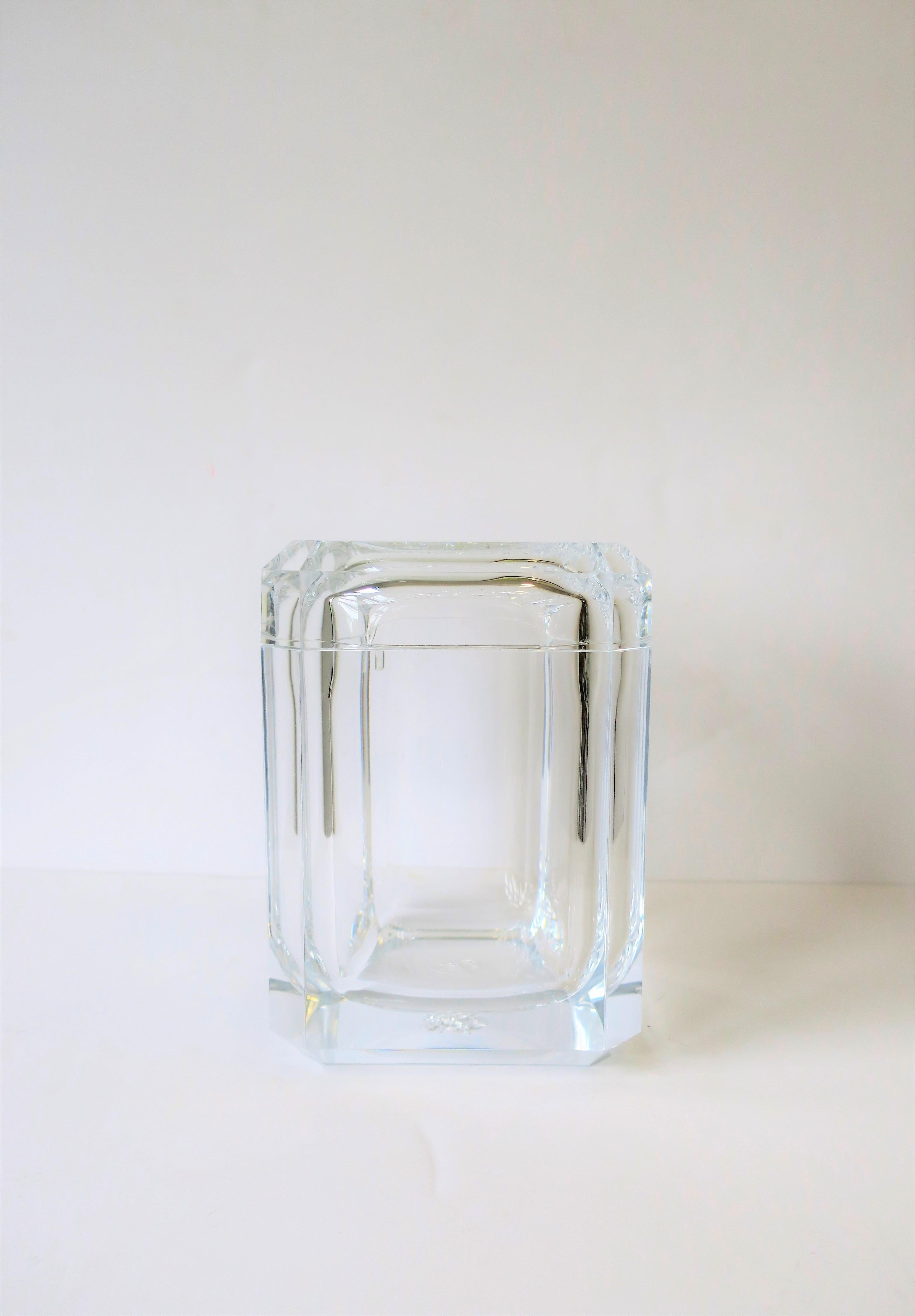 A Lucite modern style ice bucket or Lucite box with a swivel top. This is a thick rectangular Lucite ice bucket with tapered corners and a top that swivels both left and right or can completely come off (as show in images.) Piece can also be used as