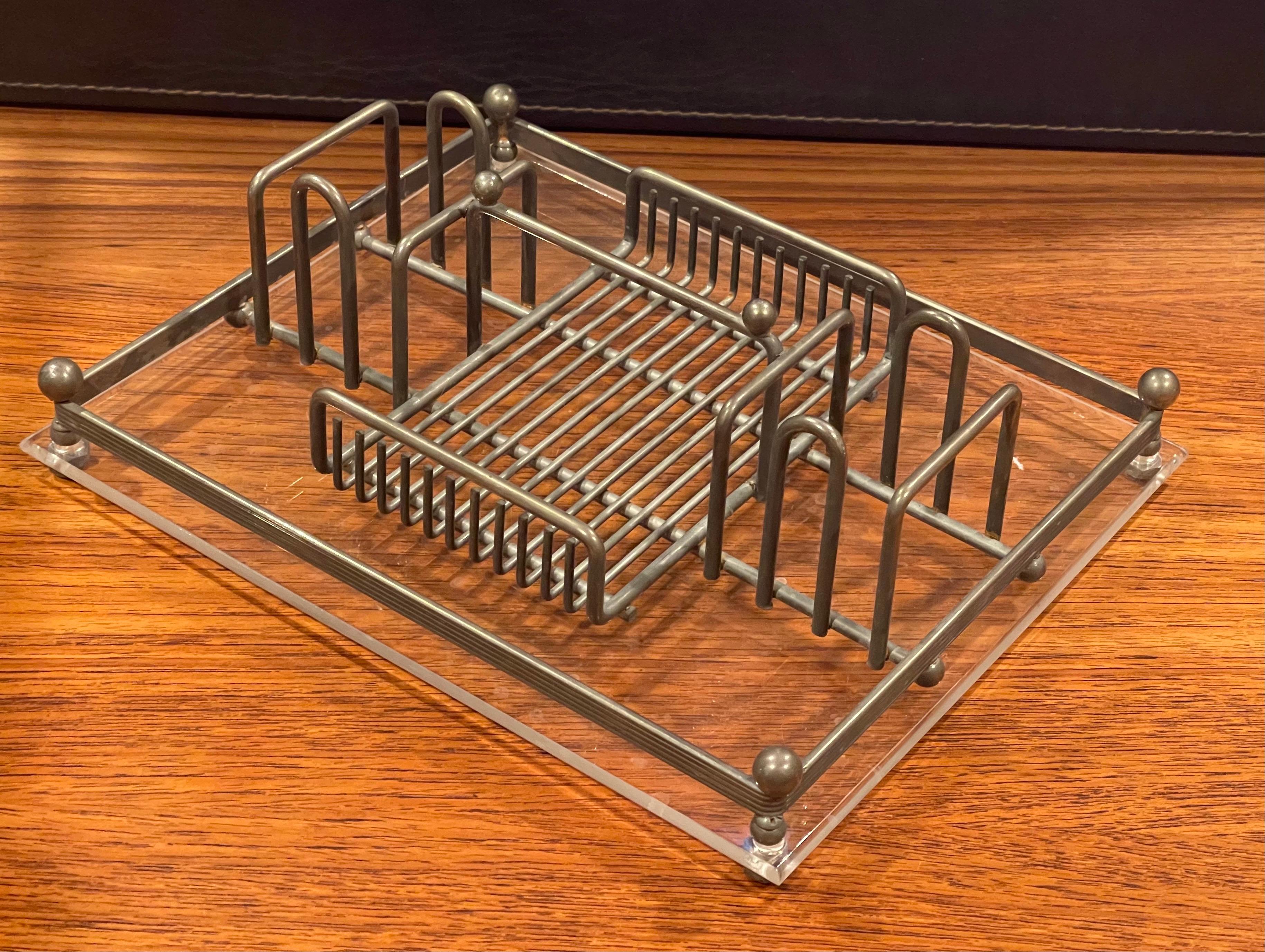 Very functional modern Lucite and steel desk organizer, circa 1980s. The piece is in very good condition and measures 8.75