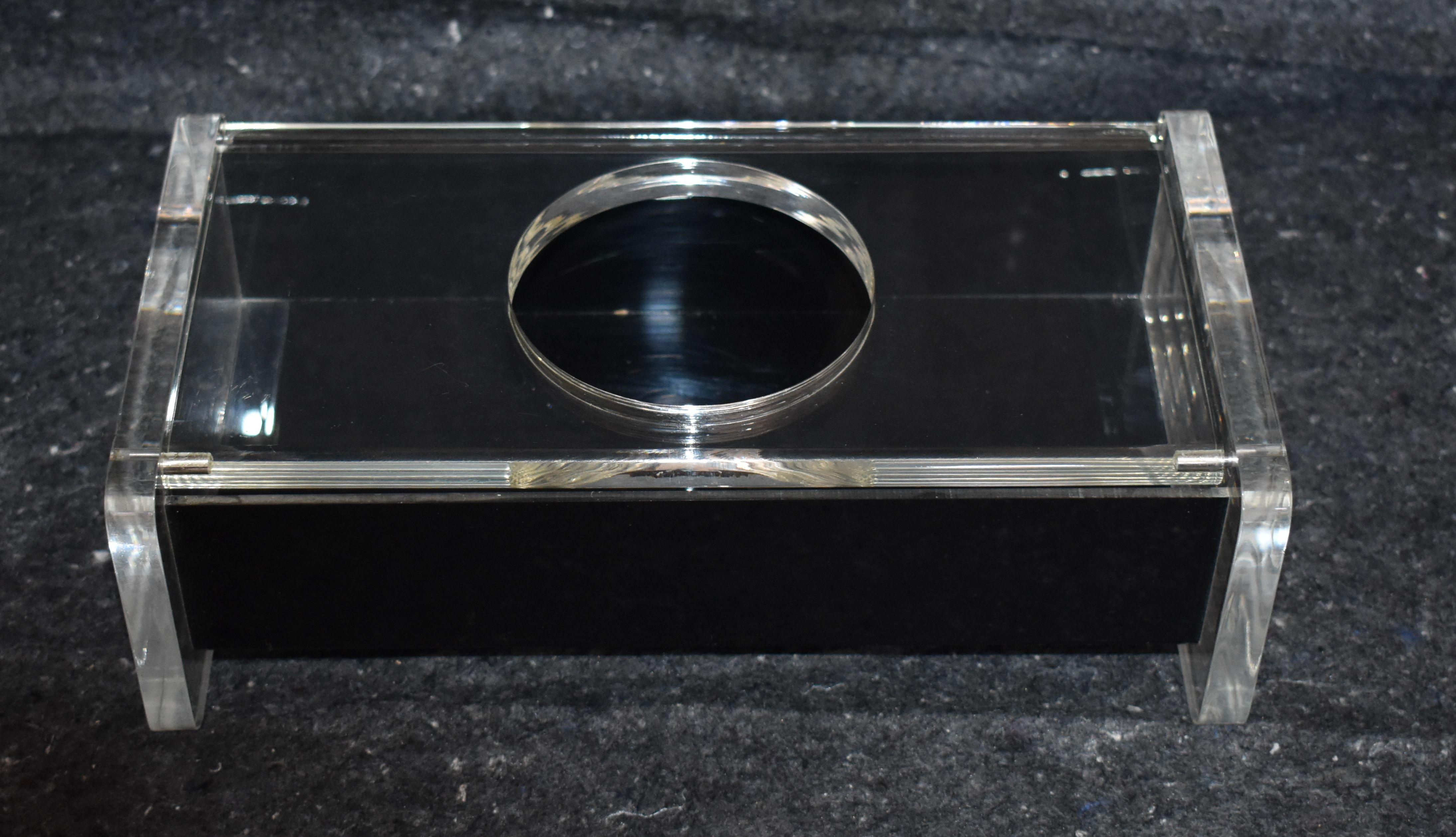 1970s black and clear Lucite tissue box.