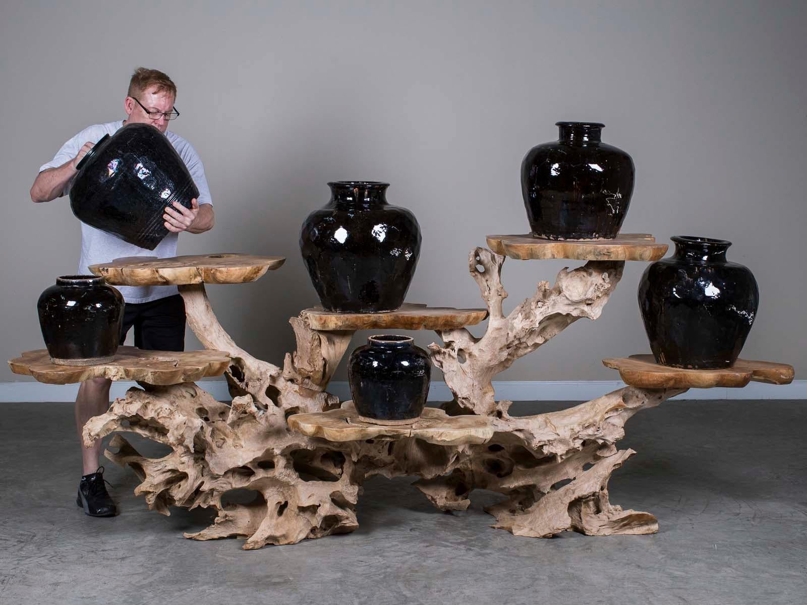 A sensational lychee wood reclaimed timber display serving table featuring six platforms of a natural organic shape. Please notice the artistic manner in which this table was designed to display and serve by the arrangement of the six asymmetrically