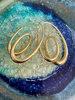 Modern M. Good Signed 14 Karat Yellow Gold Loop de Loop Hoop Earrings