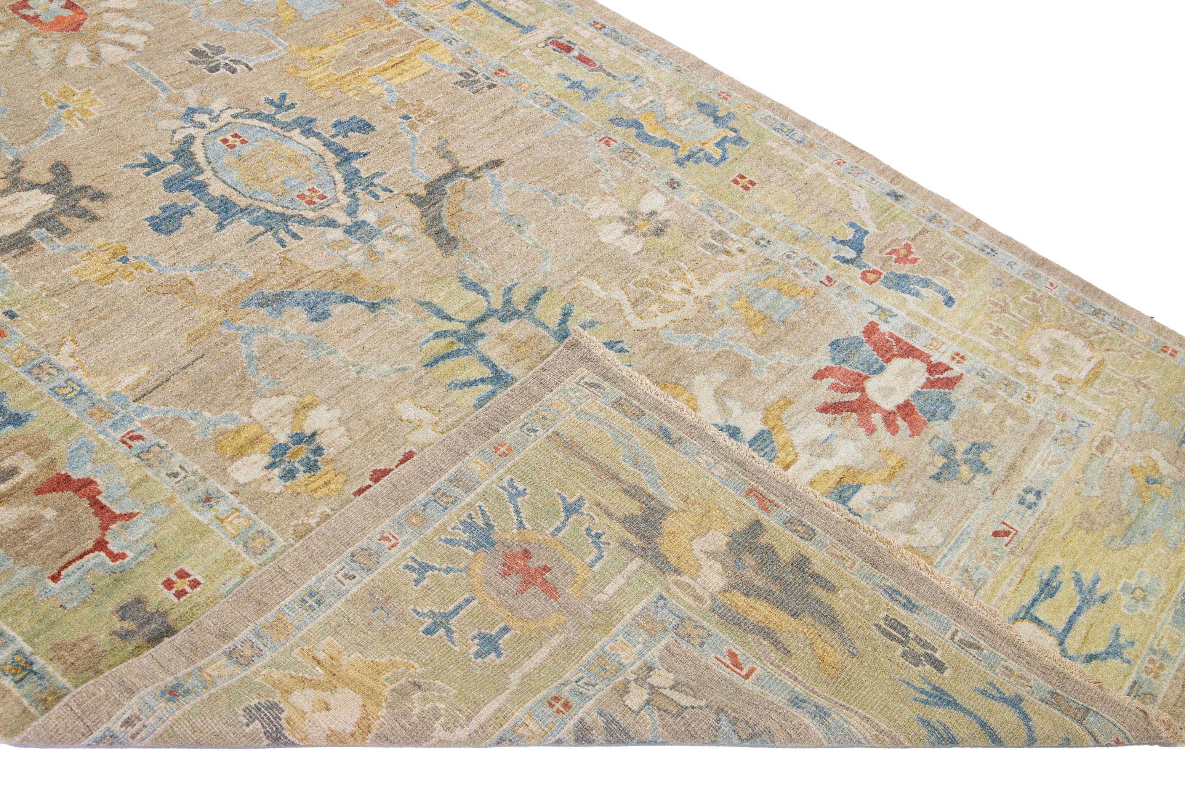 Modern Mahal hand-knotted wool runner with a brown field. This piece has a green-designed frame and multicolor accent colors that features a gorgeous all-over floral design.

This rug measures: 6'2