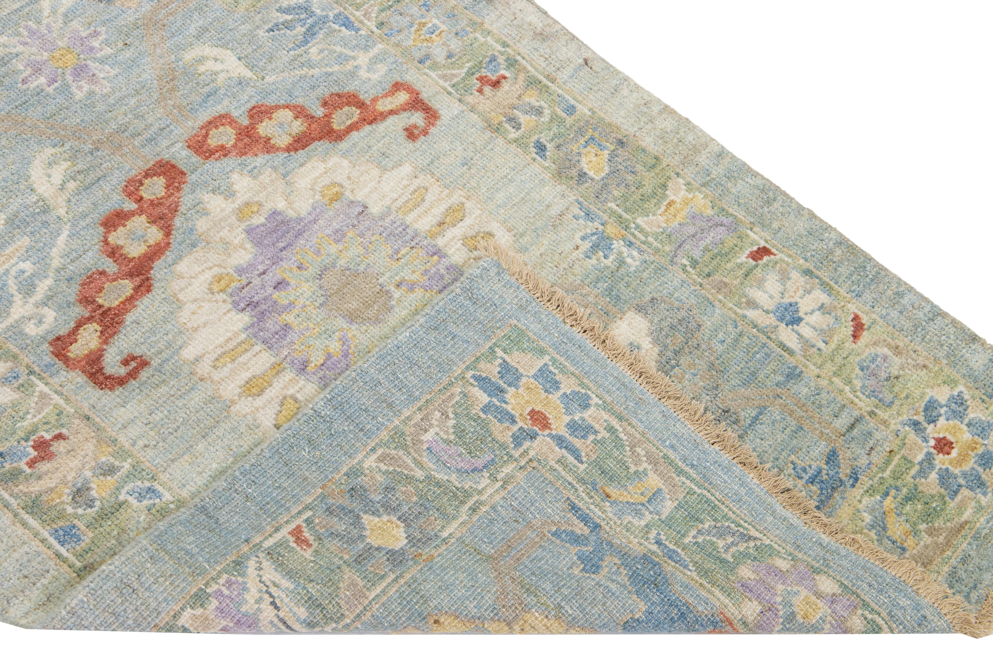Modern Mahal hand-knotted wool runner with a blue field. This piece has a green-designed frame and multicolor accent colors that features a gorgeous all-over floral design.

This rug measures: 3'2