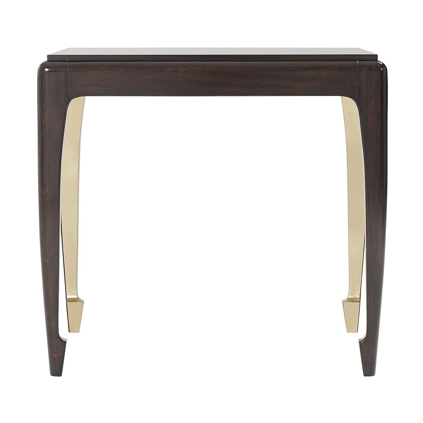 Mid-Century Modern style Chinese influenced mahogany veneered top and solid mahogany curved leg side table with hand-leafed 18-karat gold finish interior legs.
Dimensions: 24