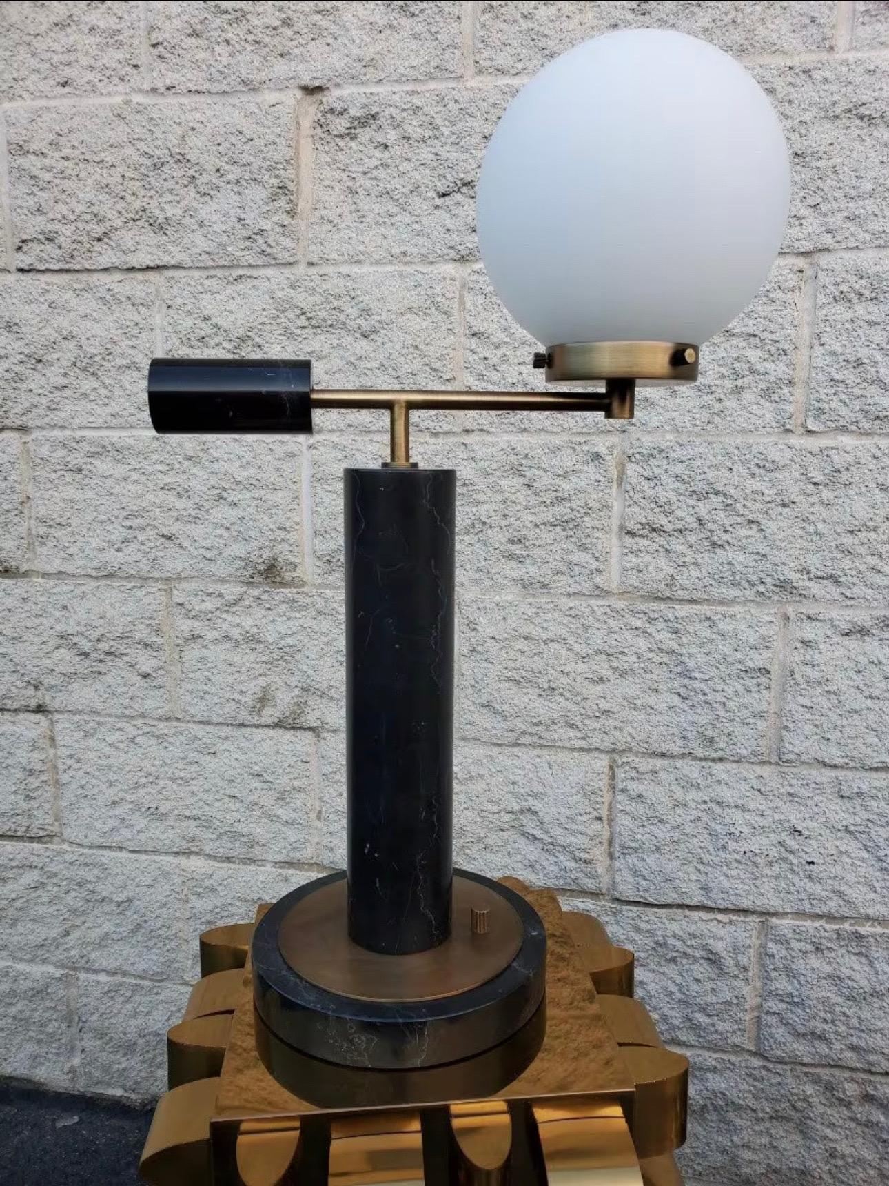 Modern Marble and Brass Table Lamps with White Ball Shade 

The lamp heavy. Works great. We also have a matching lamp with 2 white ball shades. 

Circa 2018

Dimensions 

H 25