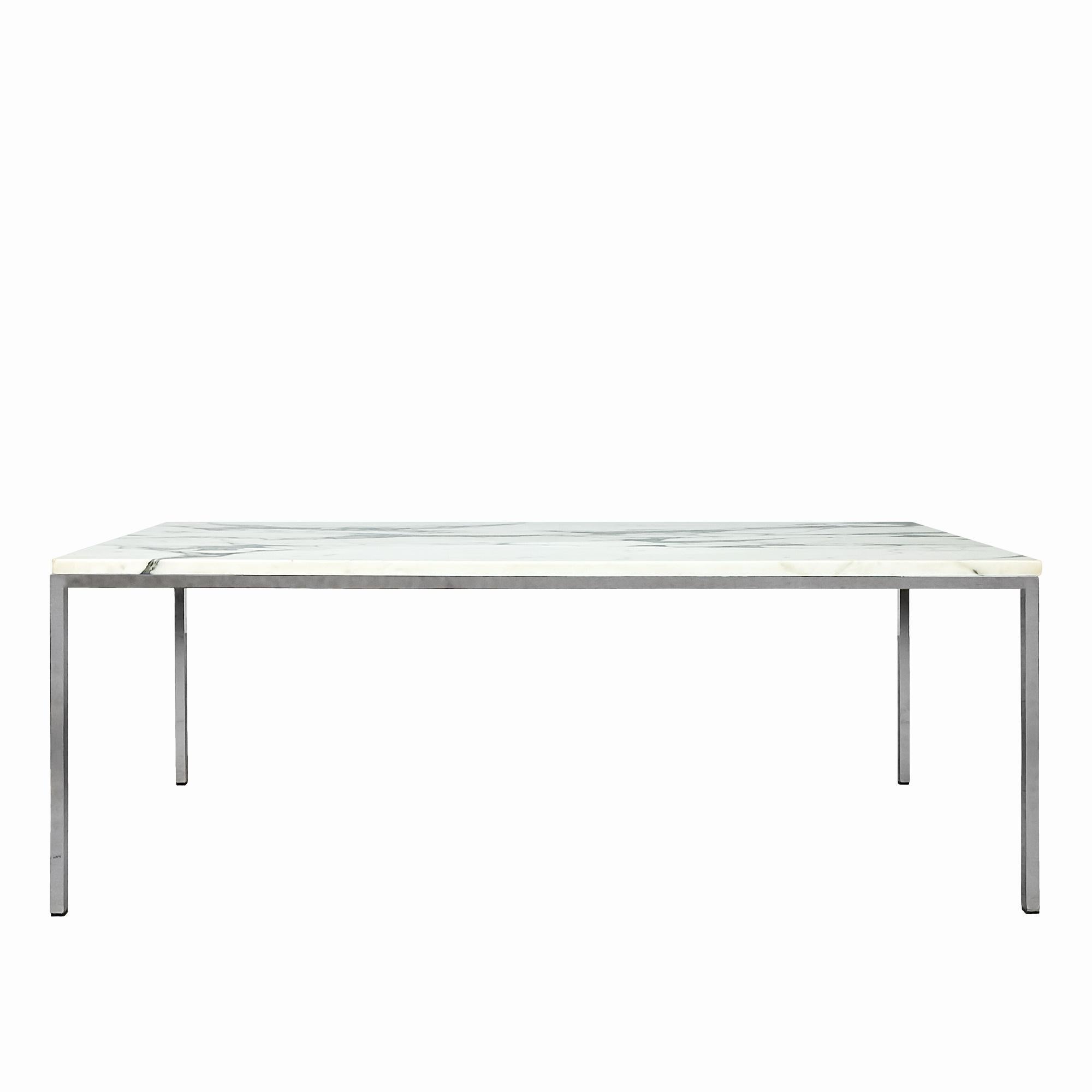 Coffee table with square base in nickel-plated steel topped with a beautiful black-gray white Carrara marble. 
Model by Florence Knoll.

United States c. 1970