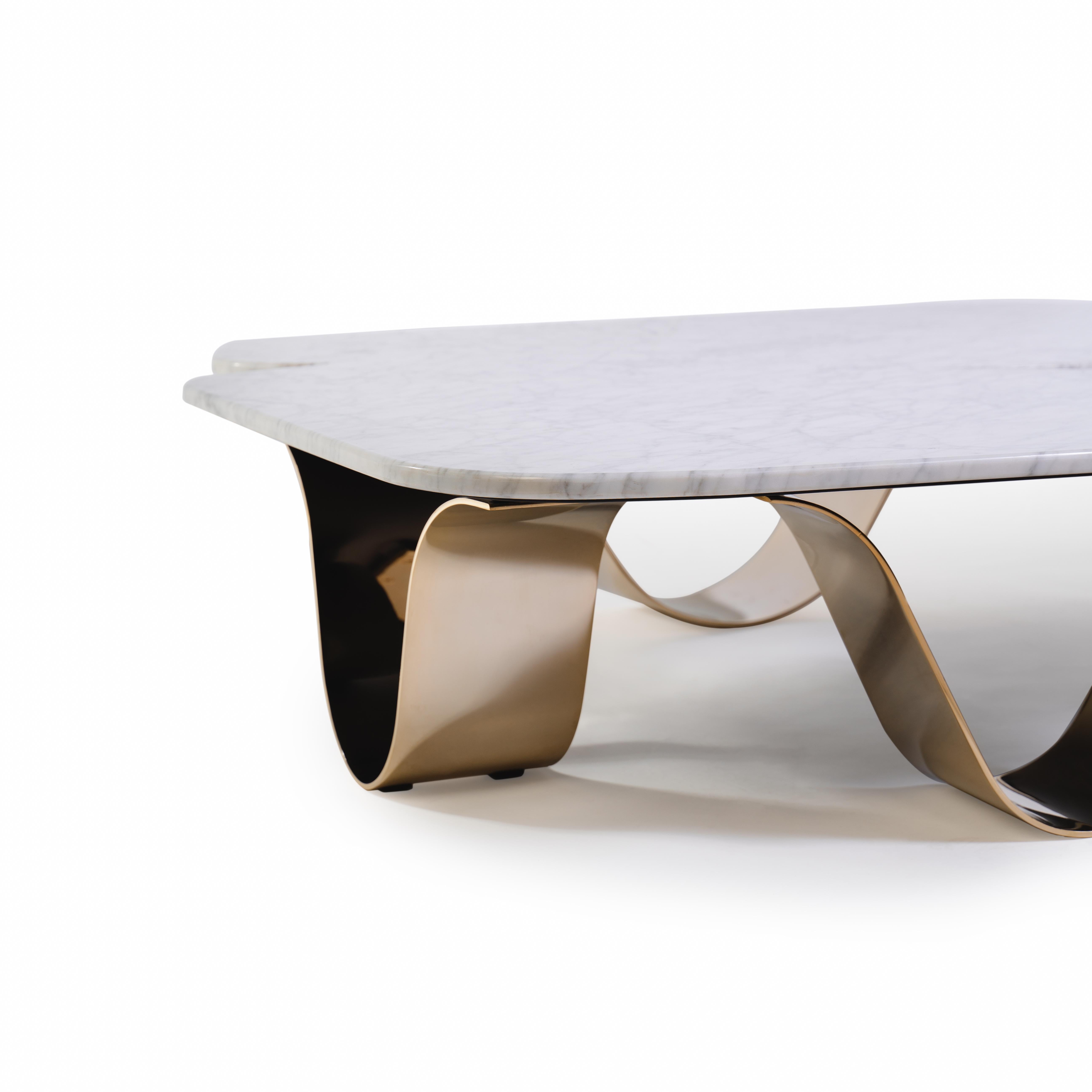 Kai Center Table 

The Kai outdoor center table is a true masterpiece in terms of design and functionality. Its elegant silhouette is defined by waves that create a harmonious and fluid shape.
The table is crafted with high-quality materials,