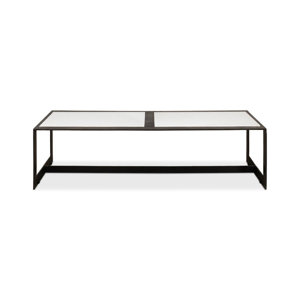 The epitome of contemporary elegance: our Modern marble top iron coffee table. With a sleek black iron frame, featuring a captivating ridged design, this piece exudes sophistication and style. The white marble top, inset flawlessly into the frame,