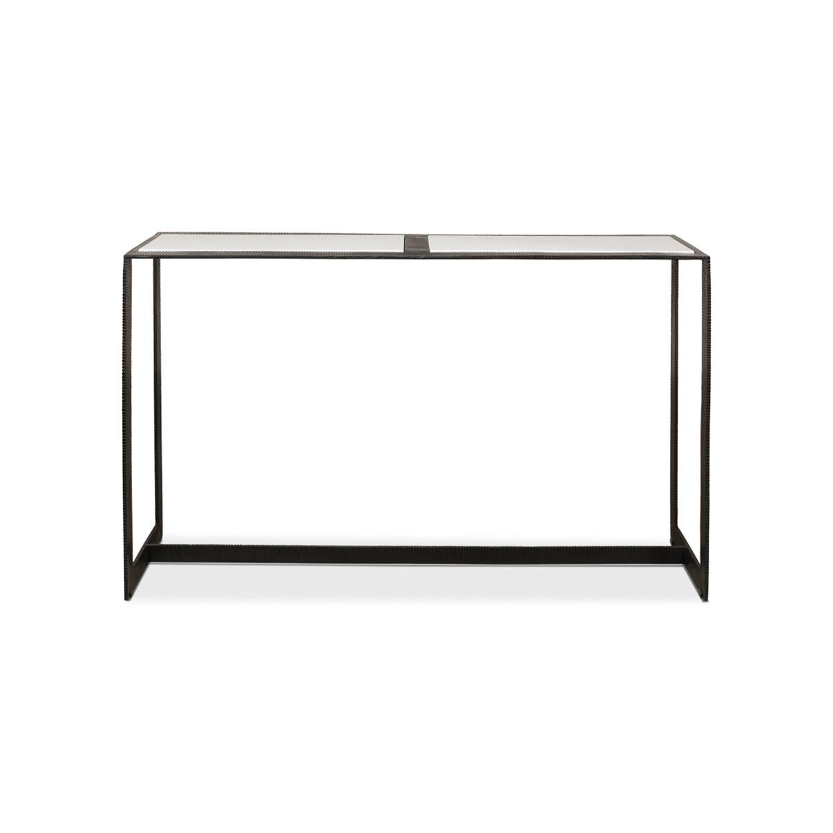 The epitome of contemporary elegance: our modern marble top iron console table. With a sleek black iron frame, featuring a captivating ridged design, this piece exudes sophistication and style. The white marble top, inset flawlessly into the frame,