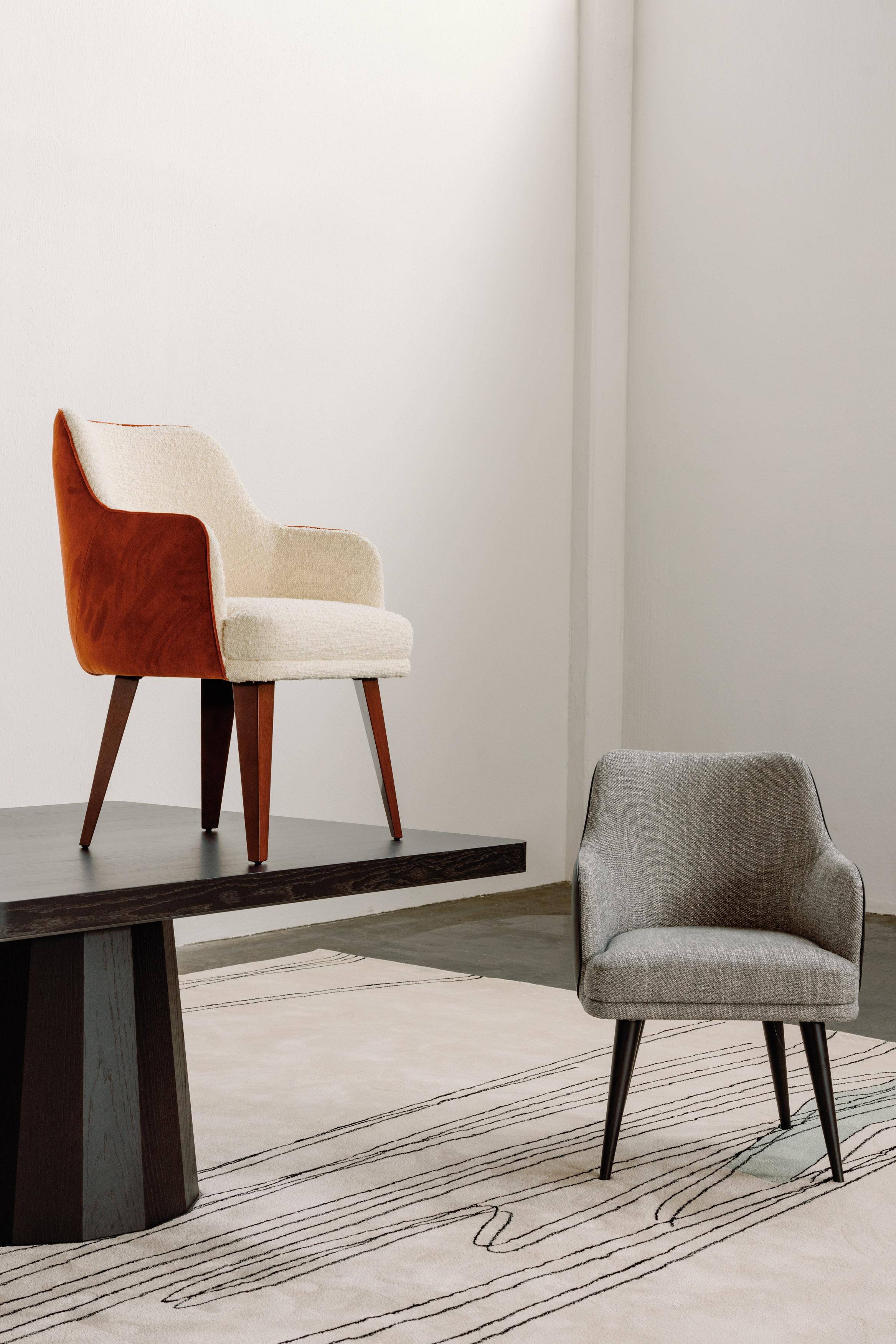 Margot Chair, Modern Collection, Handcrafted in Portugal - Europe by GF Modern.

The Margot bouclé dining chair stands as a contemporary piece that redefines the standards of modern living. The interplay of soft, graceful lines and premium materials