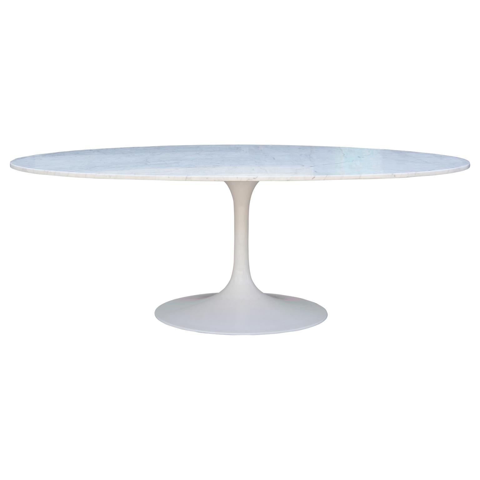 Gorgeous Saarinen style table base with a lovely oval Carrara marble top by Maurice Burke. In the style of Knoll.