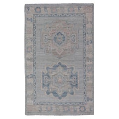 Modern Medallion Oushak with Light Gray Background and Neutral Colors