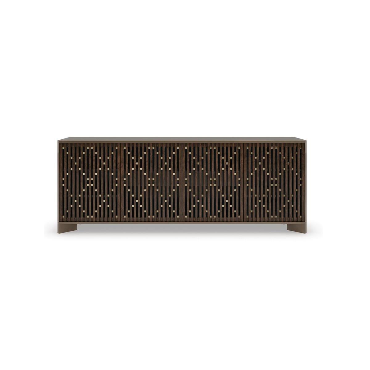 Encased in Brushed Antique Brass paint, linear door fronts feature a slatted wood construction, separated by cube-shaped gold metal spacers to create an argyle diamond pattern.

Features open storage behind center doors, with two drawers and