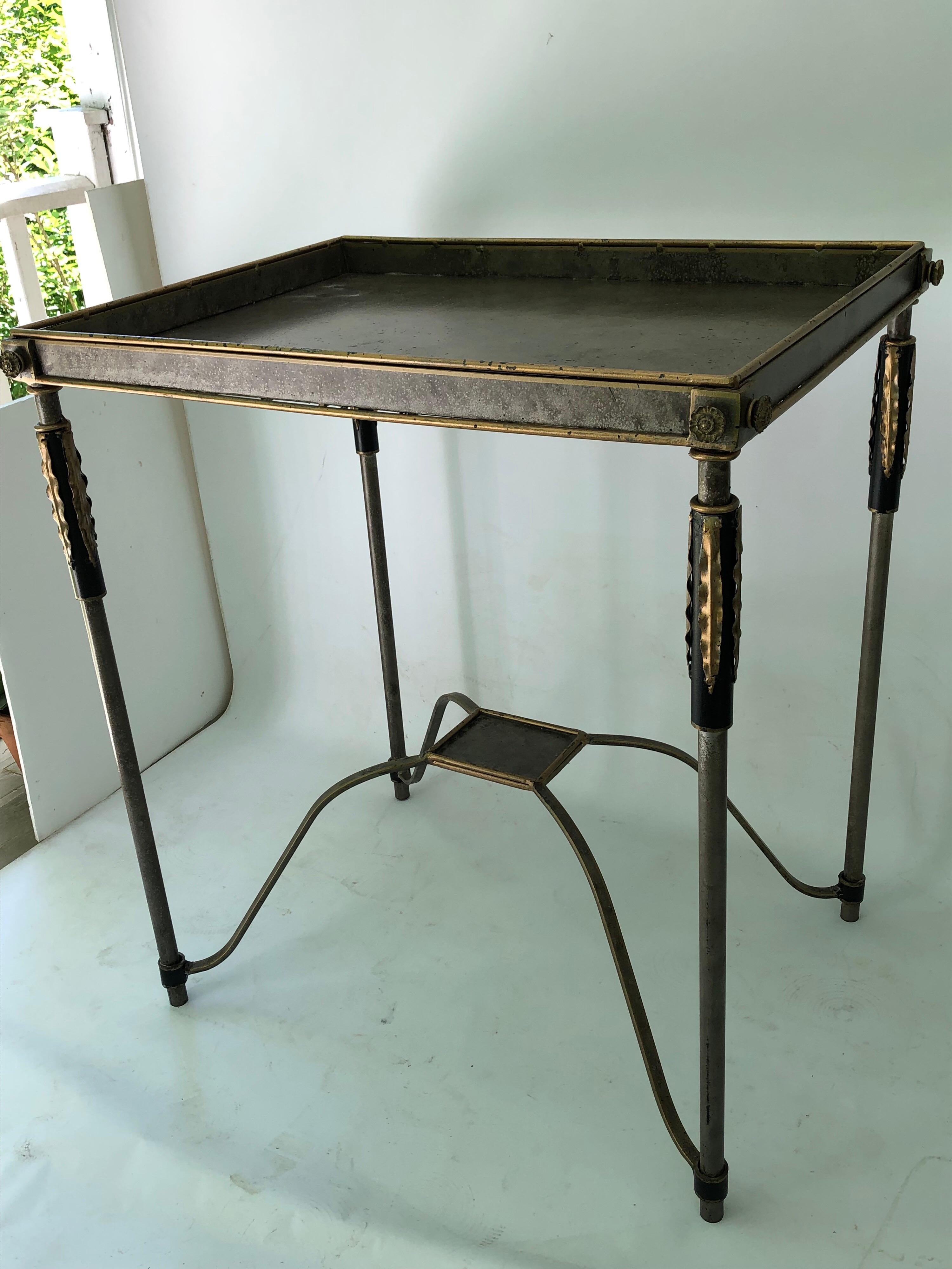 Handsome modern metal and gilt-decorated metal stand. Would even work well on a porch since it is metal.