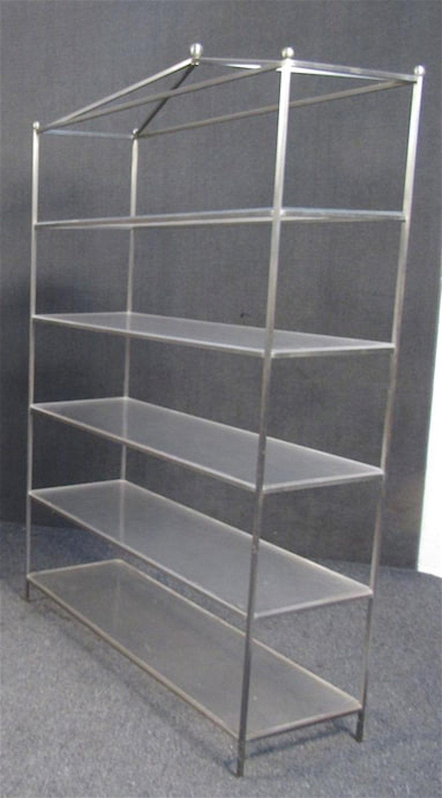 Tall metal frame bookcase with plexiglass shelves. 

Please confirm the item location (NY or NJ).