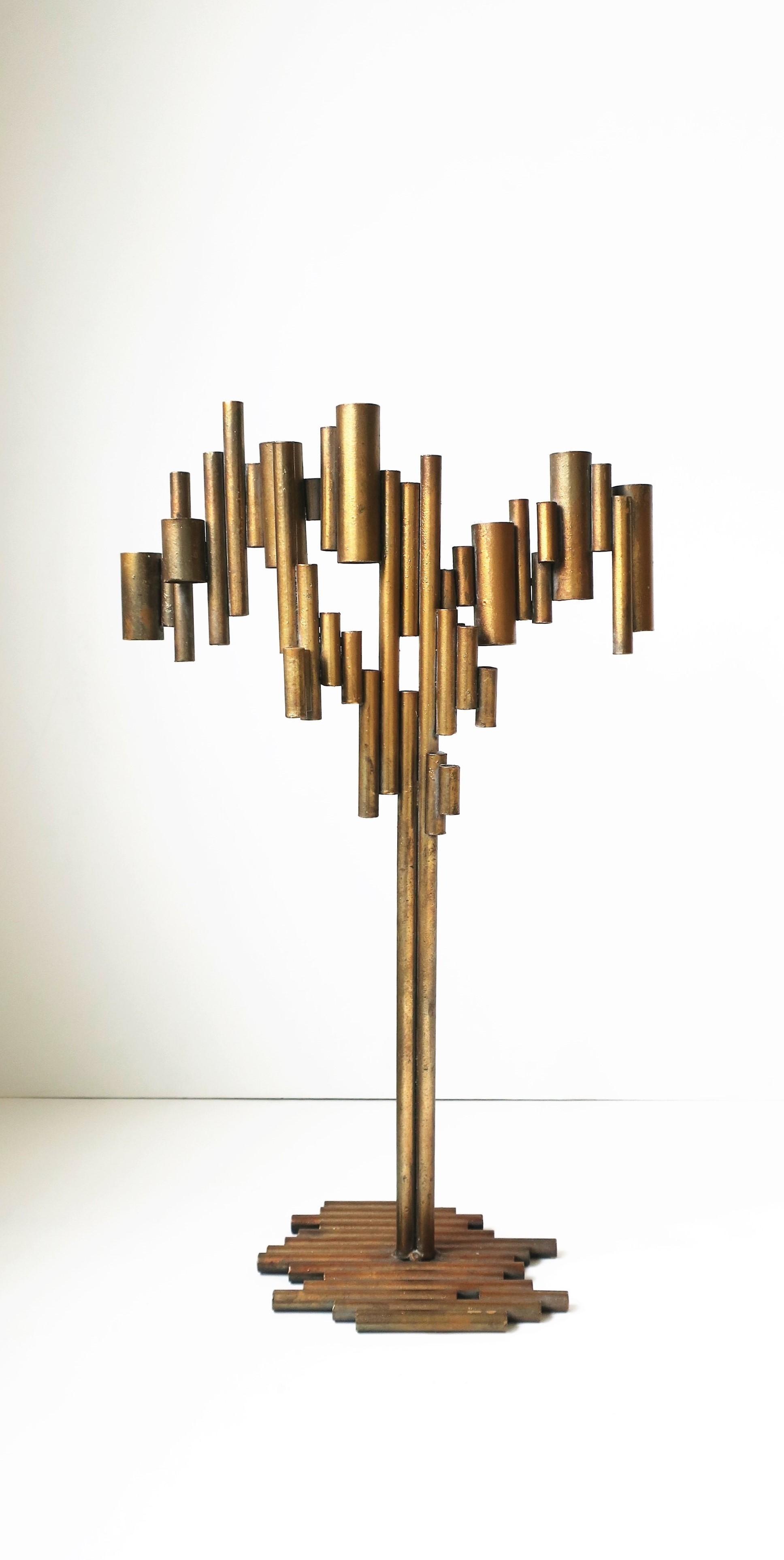 A beautiful and relatively tall bronze and copper colored Modern metal Brutalist style sculpture or candelabra piece. This tubular metal bonze-copper colored candelabra piece can also work well as a standalone sculpture, and as a modern Menorrhea,