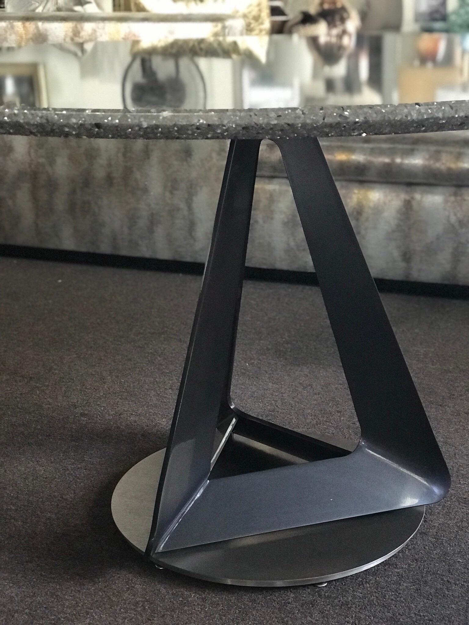 This Beauty came from one of the most expensive, upscale country clubs in the Palm Springs area. I don't know much about it, other than it is a modern sculpture in the form of a dining or game table. It was custom made for the residence. I am pretty