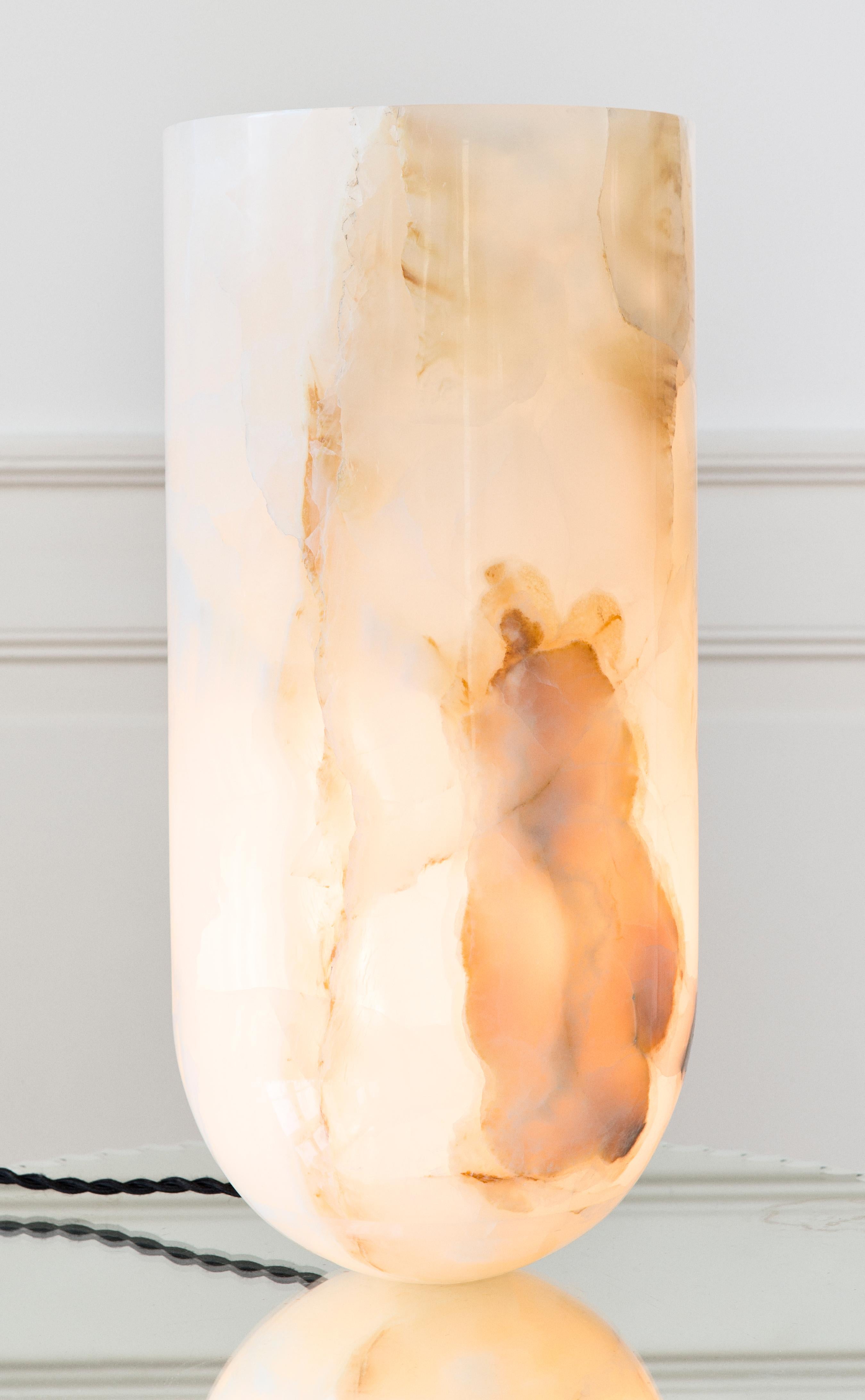 Table lamp made of one-piece of carved white onyx marble. 
Designed in 2007 by Michael Anastassiades.